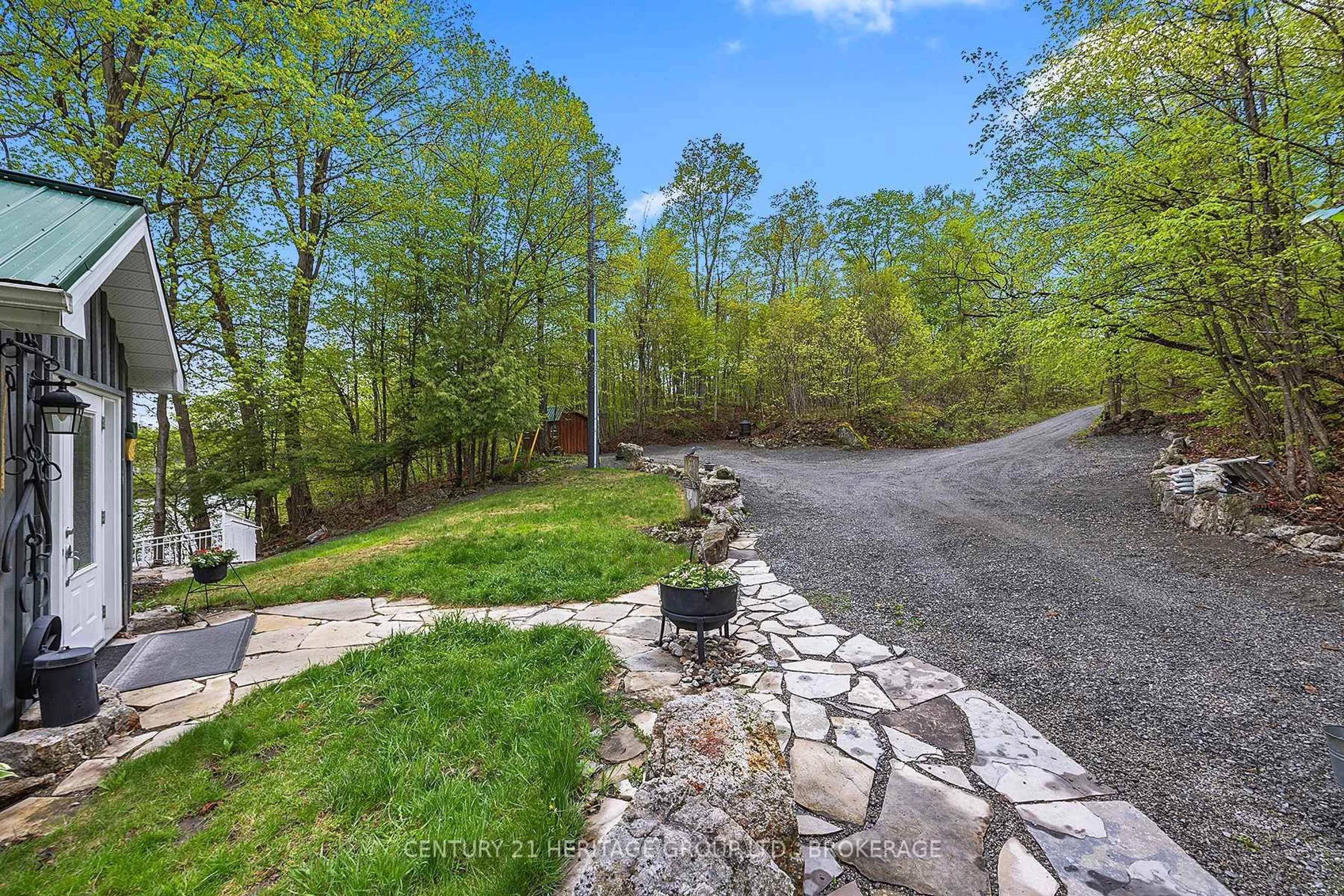 A pic from outside/outdoor area/front of a property/back of a property/a pic from drone, unknown for 8126 Perth Rd, Perth Road Ontario K0H 2L0