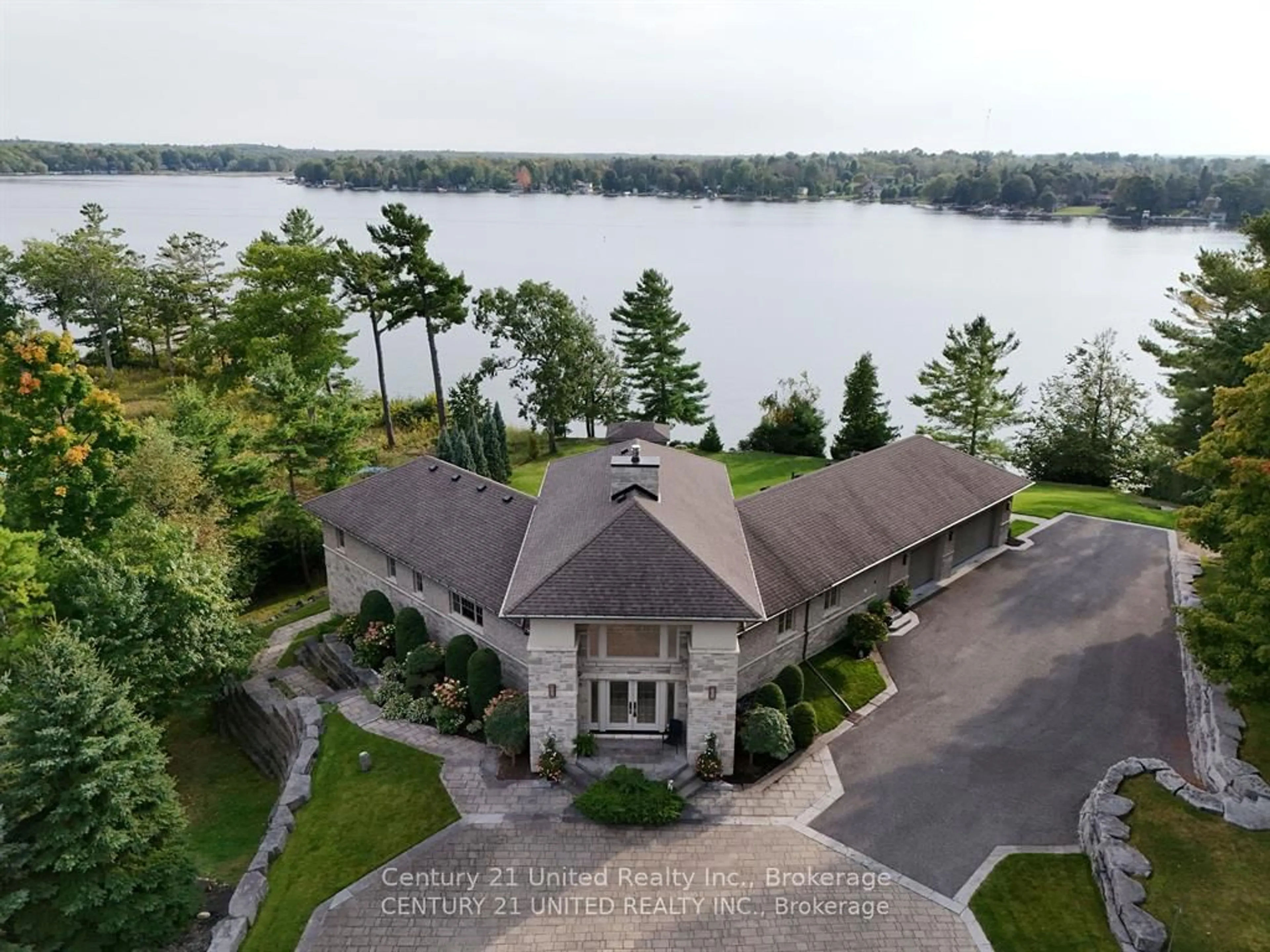 A pic from outside/outdoor area/front of a property/back of a property/a pic from drone, water/lake/river/ocean view for 44 Fire Route 70 Rte, Galway-Cavendish and Harvey Ontario K0L 1J0
