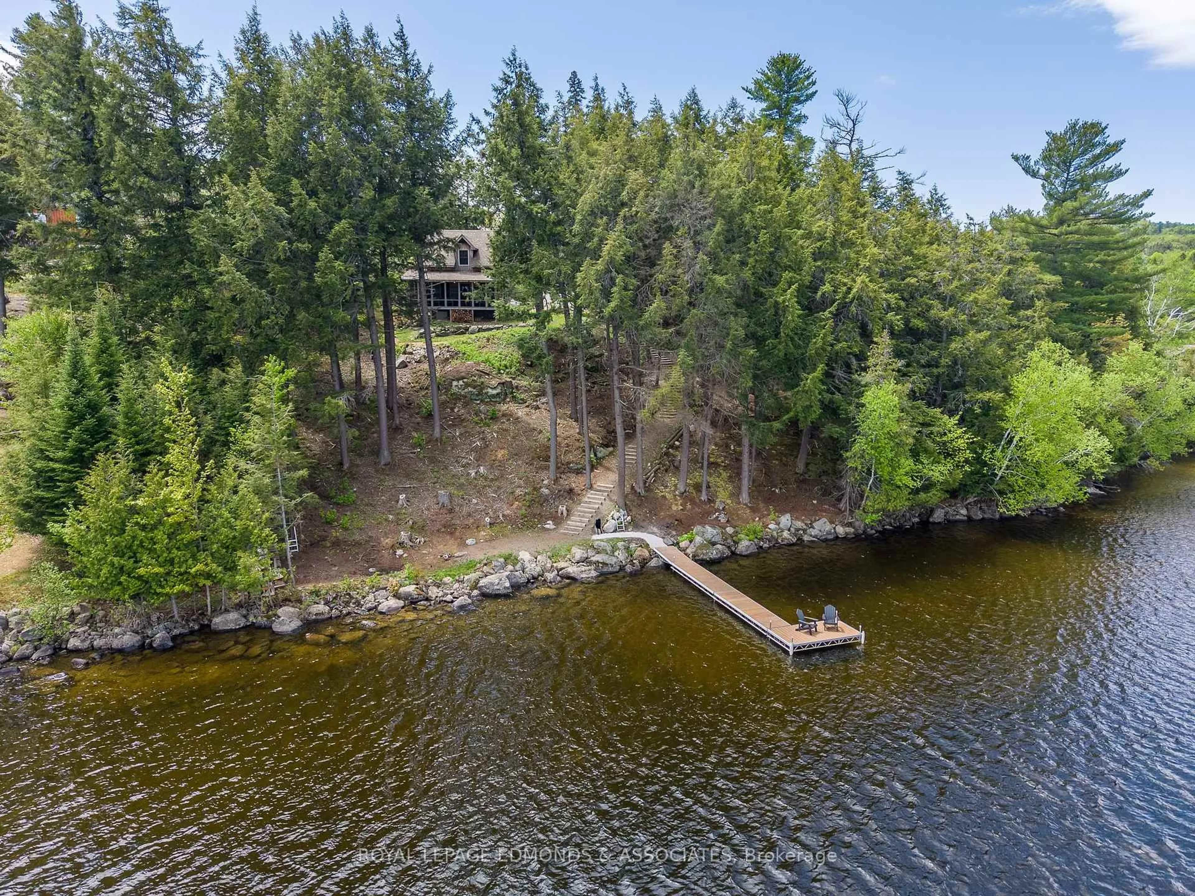 A pic from outside/outdoor area/front of a property/back of a property/a pic from drone, water/lake/river/ocean view for 135B Bleski Rd, Barry's Bay Ontario K0J 1B0