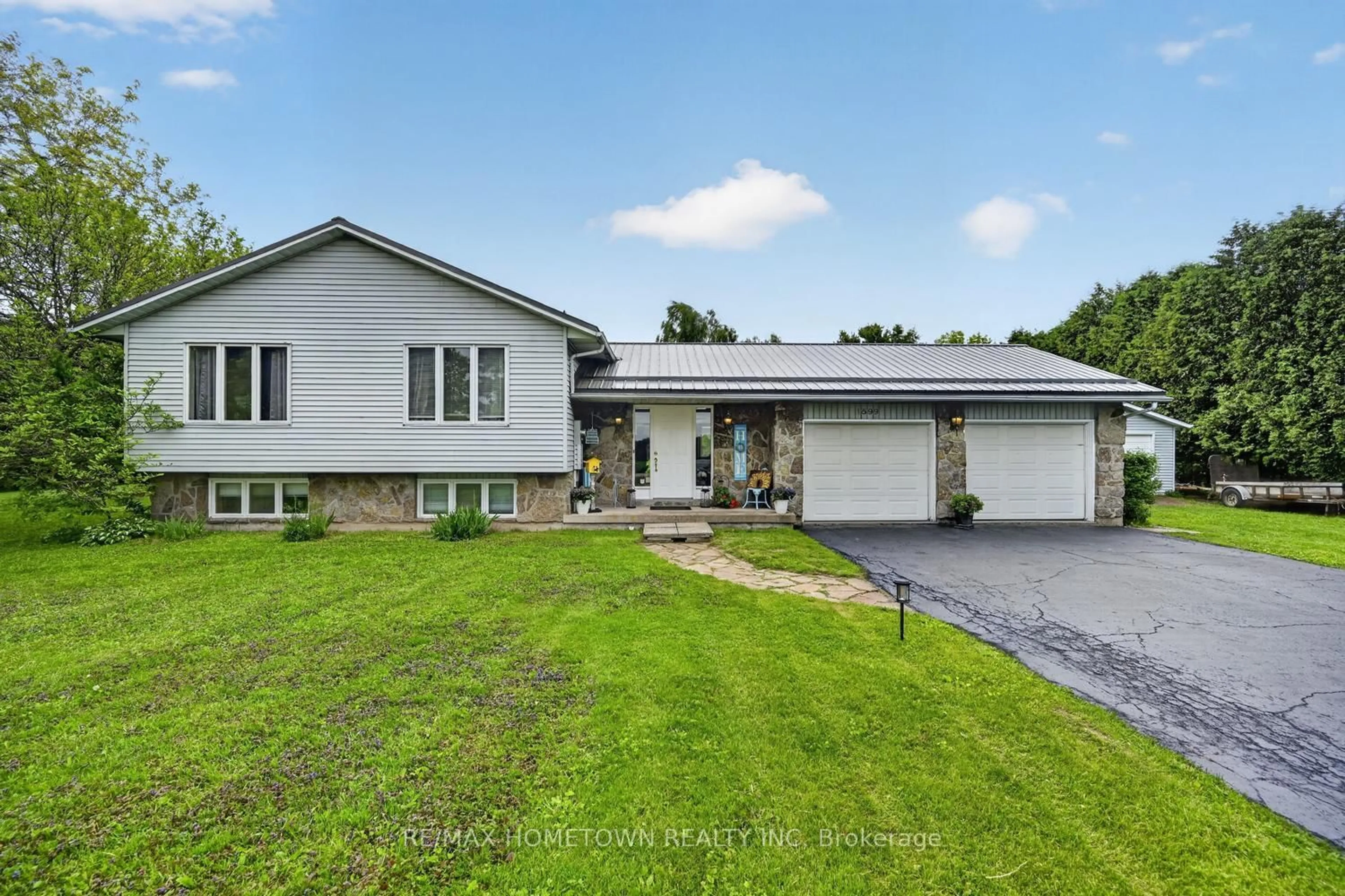 Home with vinyl exterior material, street for 1599 County Rd 2 Rd, Front of Yonge Ontario K0E 1R0