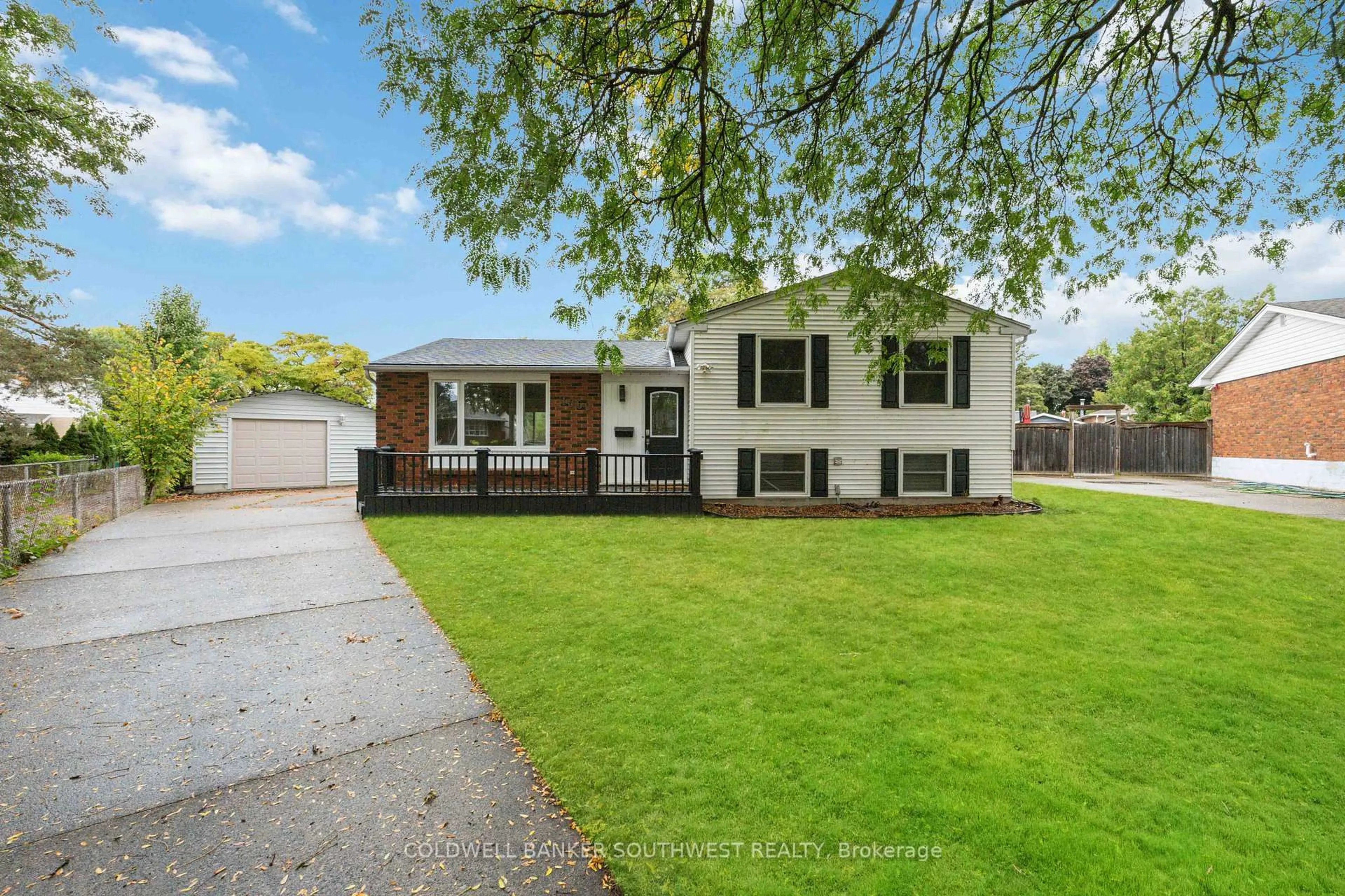 Home with brick exterior material, street for 1060 Camelot Cres, Sarnia Ontario N7S 3L3