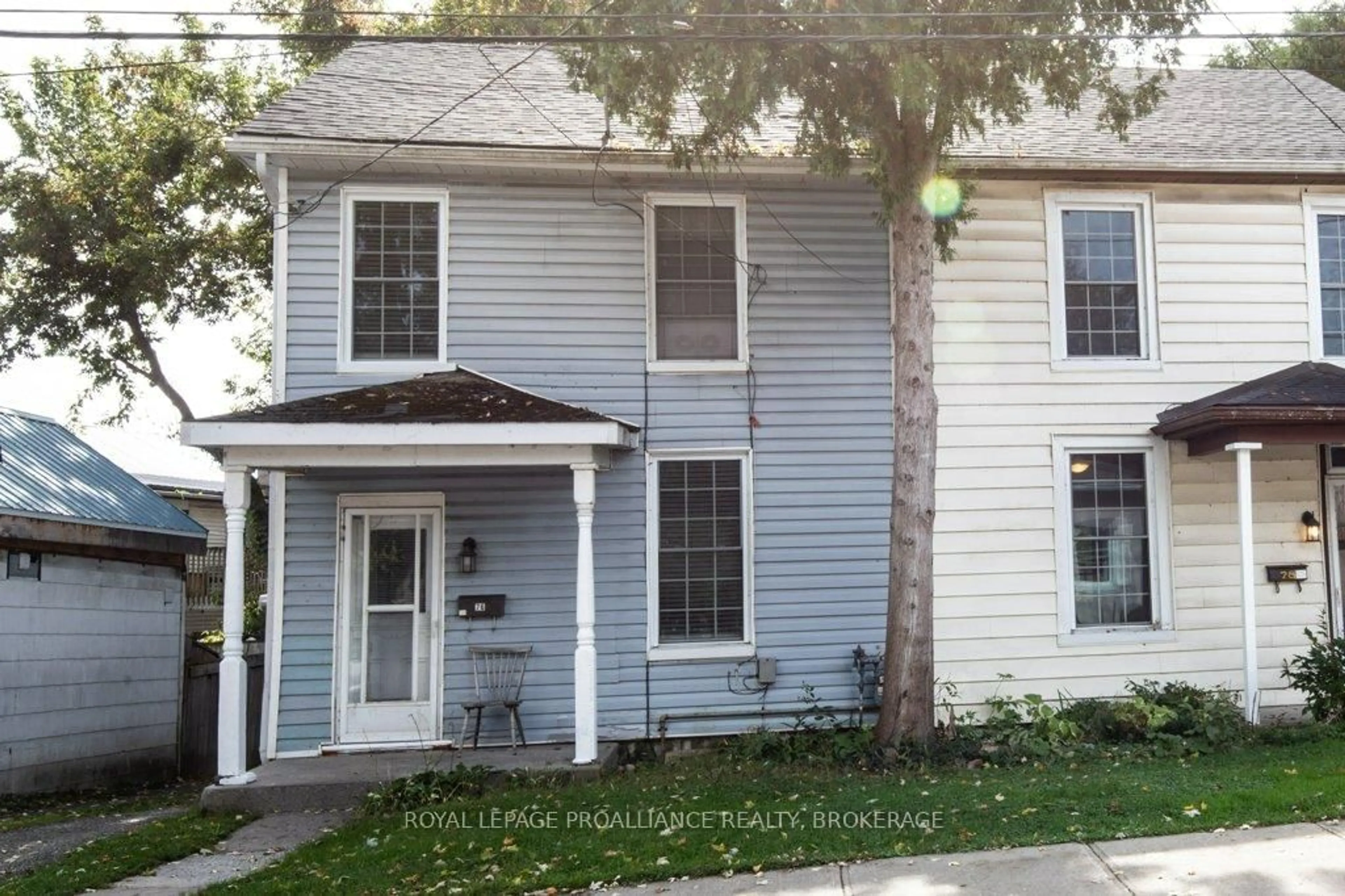 Home with vinyl exterior material, street for 76-78 North St, Kingston Ontario K7K 1J9