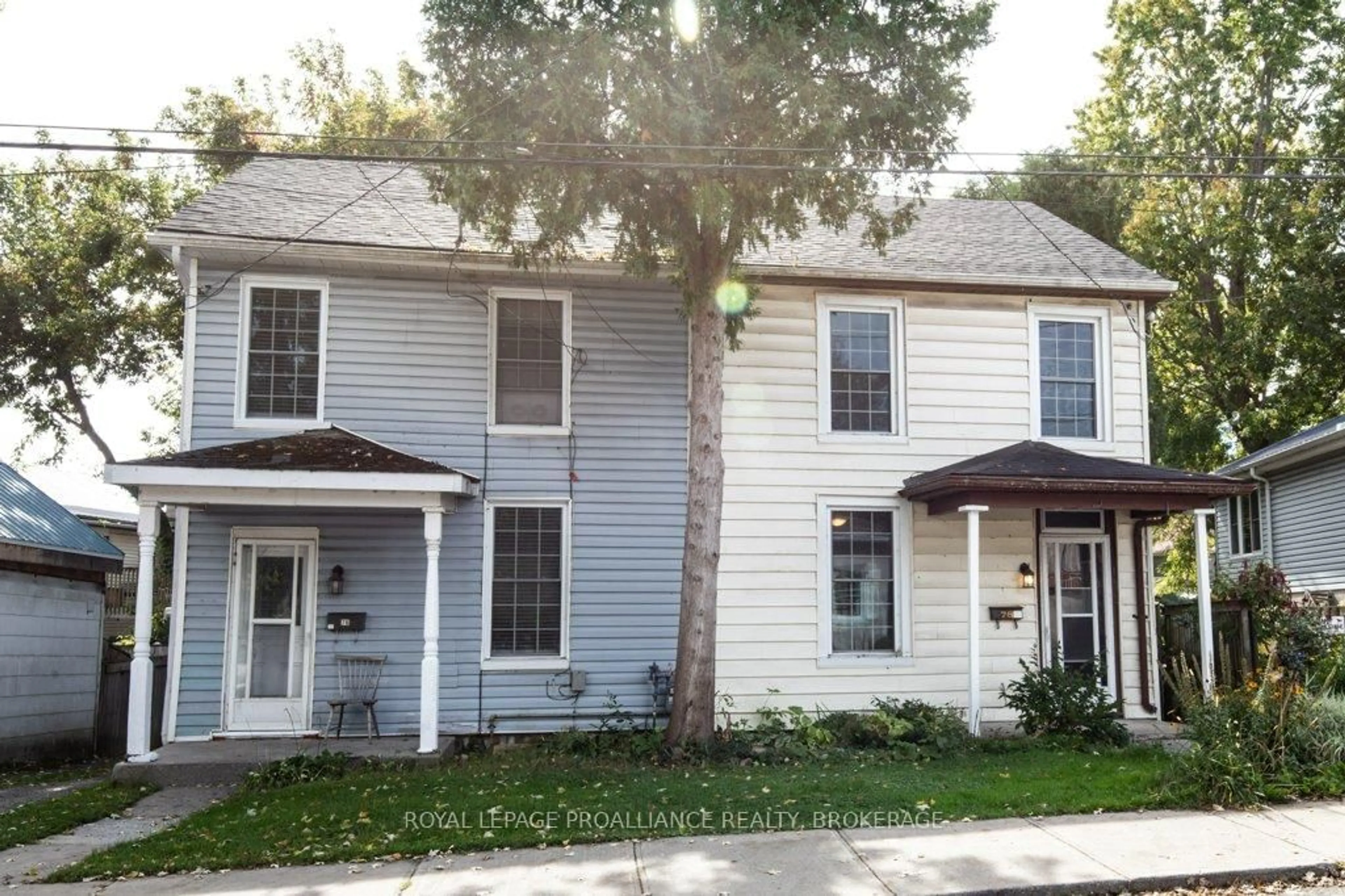 Home with vinyl exterior material, street for 76-78 North St, Kingston Ontario K7K 1J9