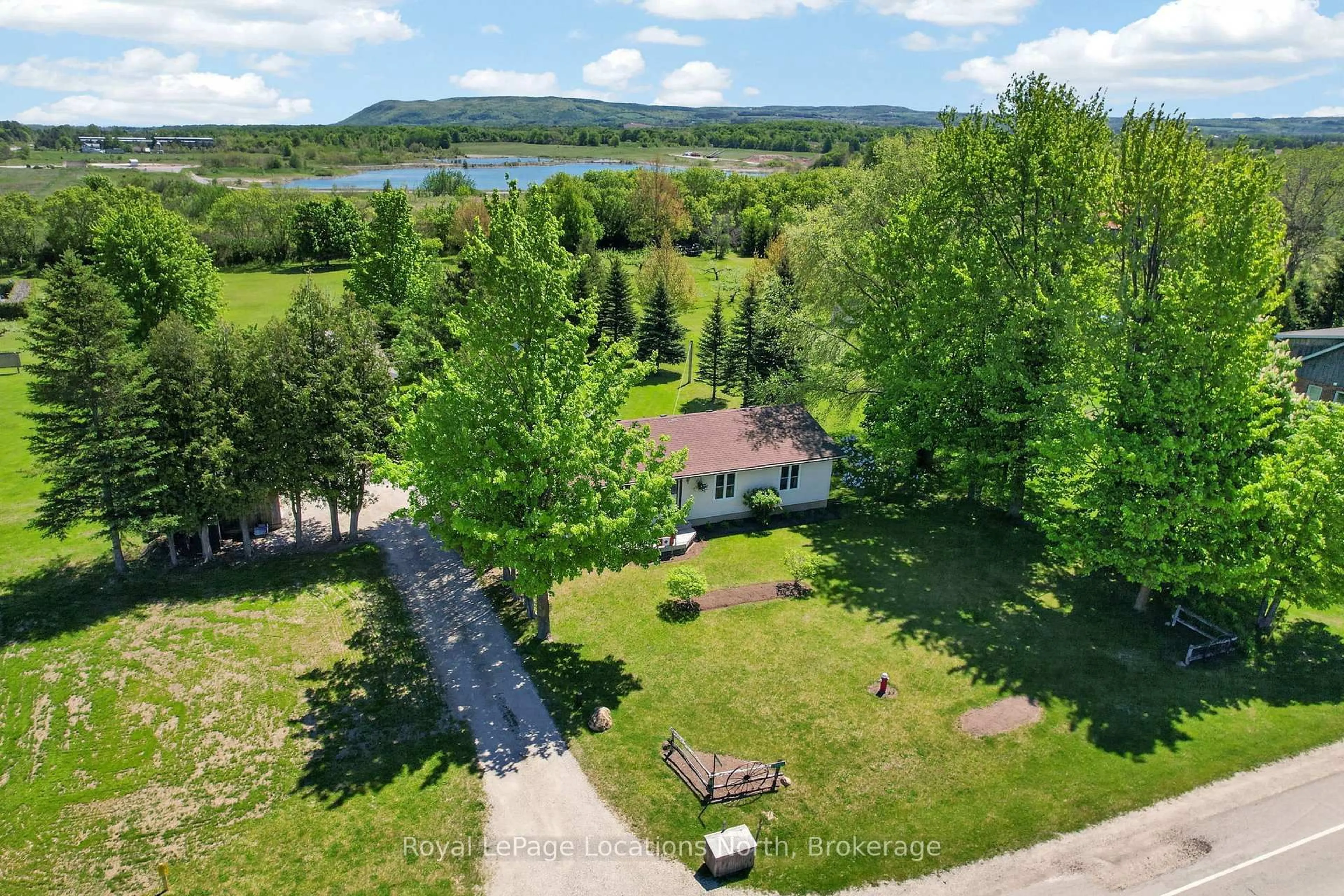 A pic from outside/outdoor area/front of a property/back of a property/a pic from drone, water/lake/river/ocean view for 788168 grey road 13 Rd, Blue Mountains Ontario N0H 1J0