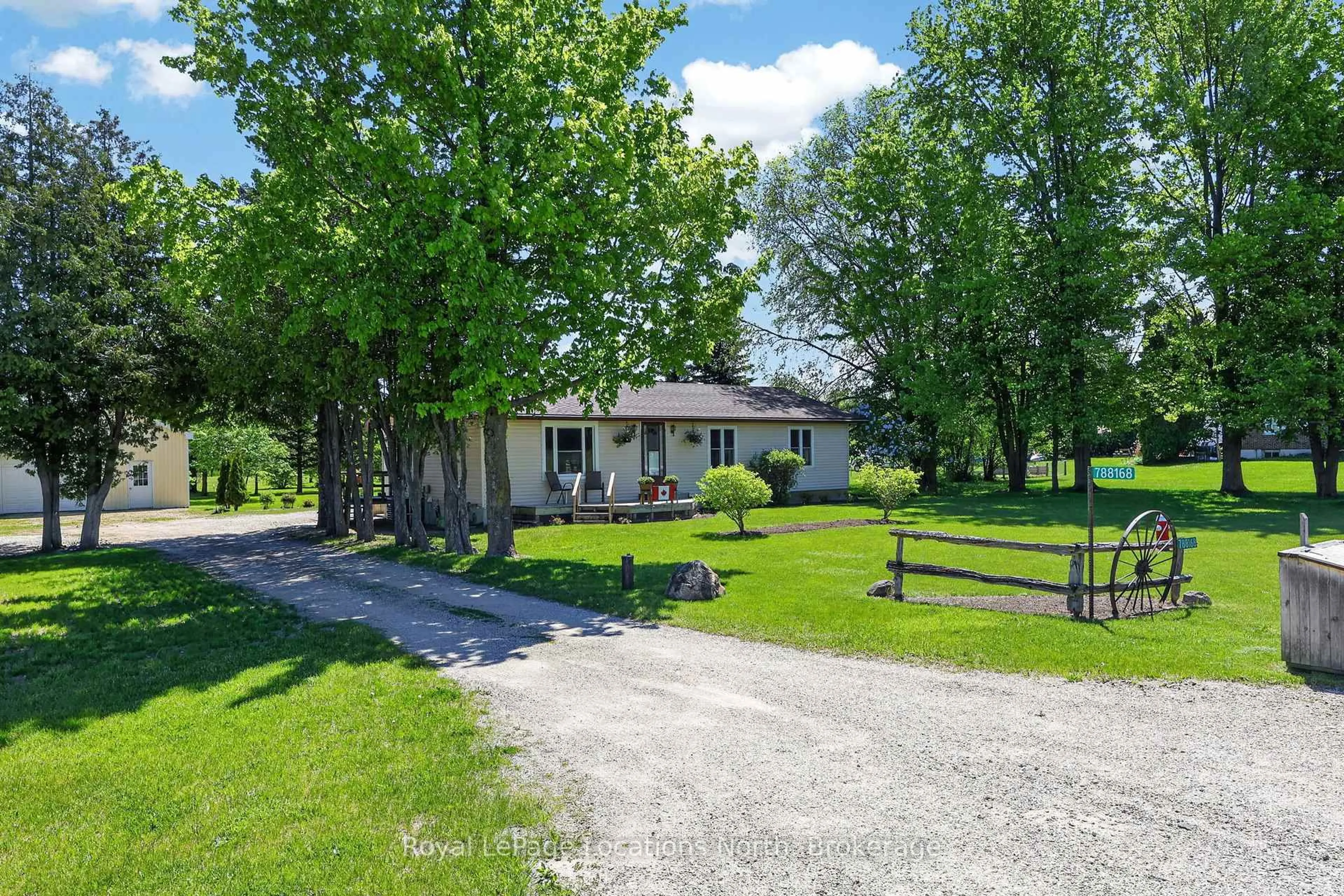 A pic from outside/outdoor area/front of a property/back of a property/a pic from drone, street for 788168 grey road 13 Rd, Blue Mountains Ontario N0H 1J0