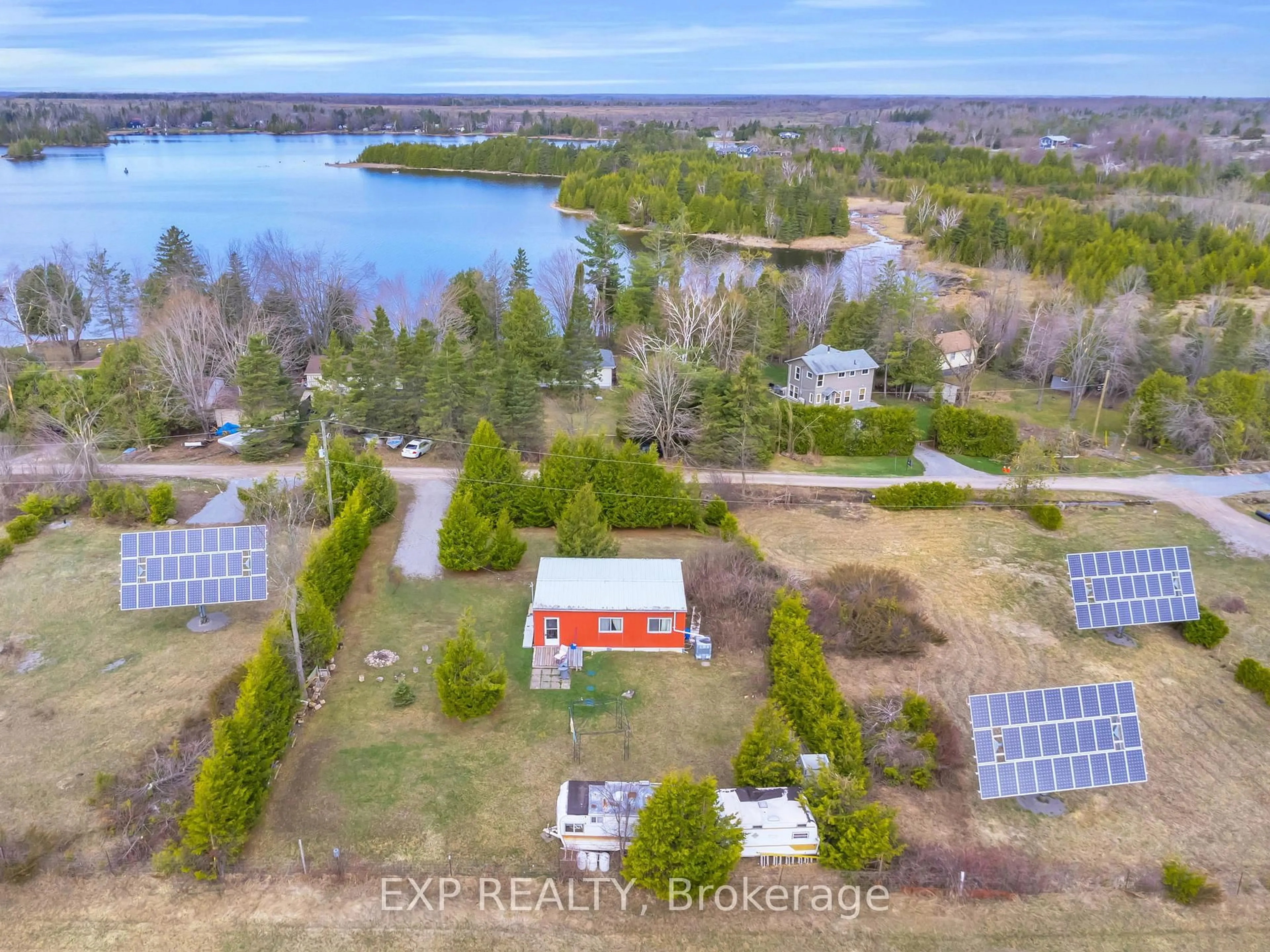 A pic from outside/outdoor area/front of a property/back of a property/a pic from drone, water/lake/river/ocean view for 70 Redcap Beach Lane, Kawartha Lakes Ontario K0M 2B0