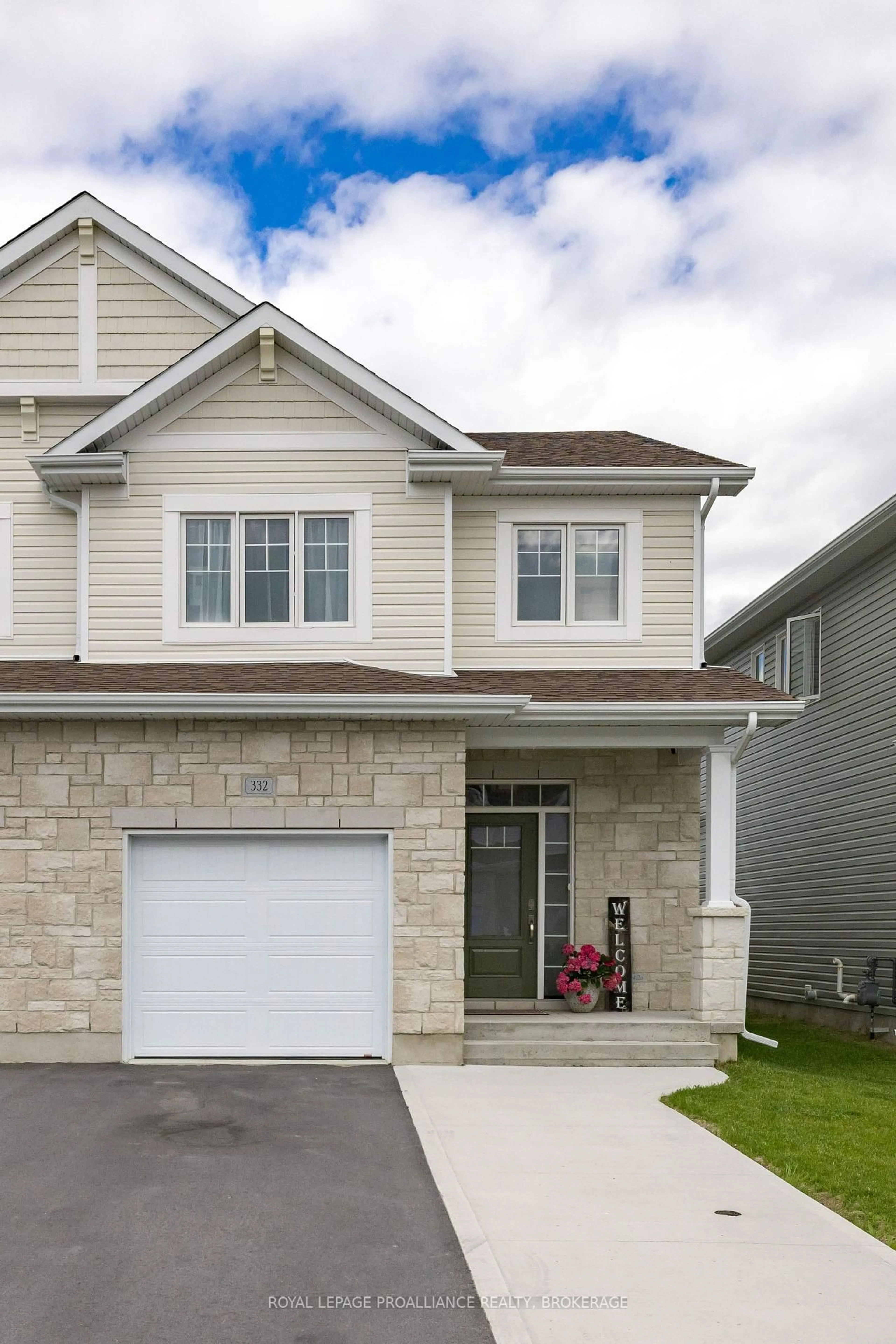 Home with vinyl exterior material, street for 332 Buckthorn Dr, Kingston Ontario K7P 0S1