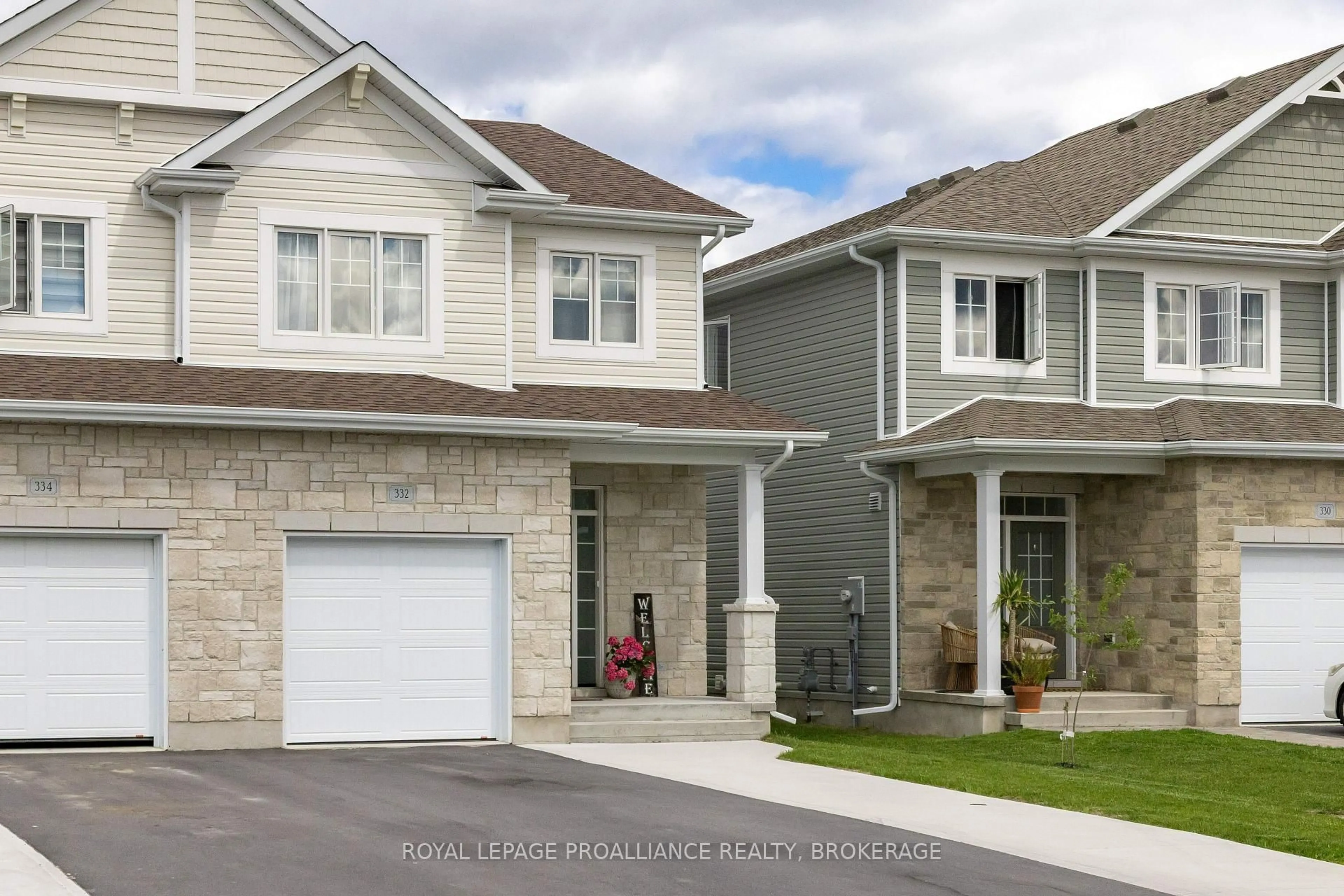 Home with vinyl exterior material, street for 332 Buckthorn Dr, Kingston Ontario K7P 0S1