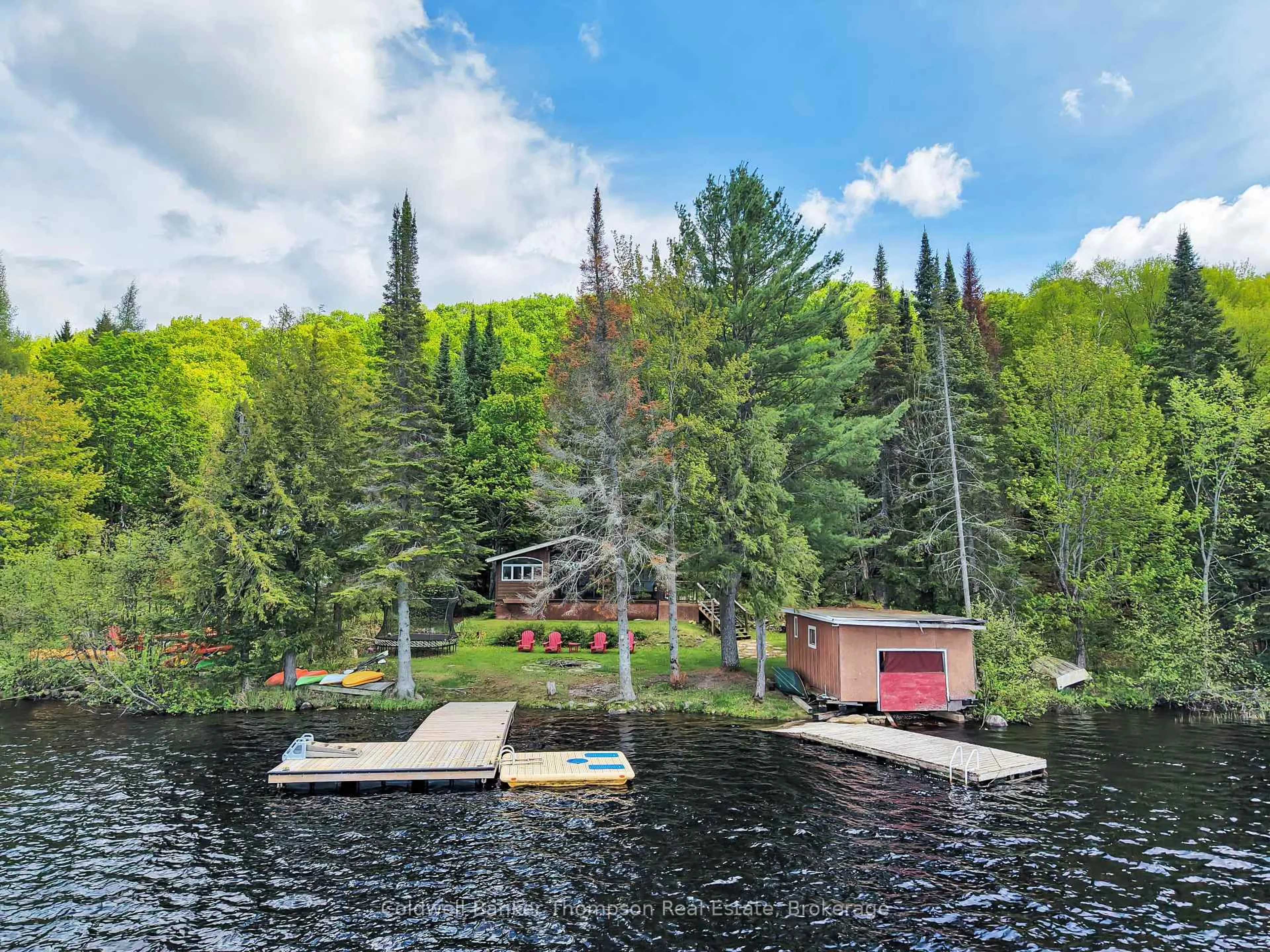 A pic from outside/outdoor area/front of a property/back of a property/a pic from drone, water/lake/river/ocean view for 1108 Stanley Rd, Bracebridge Ontario P0B 1L0