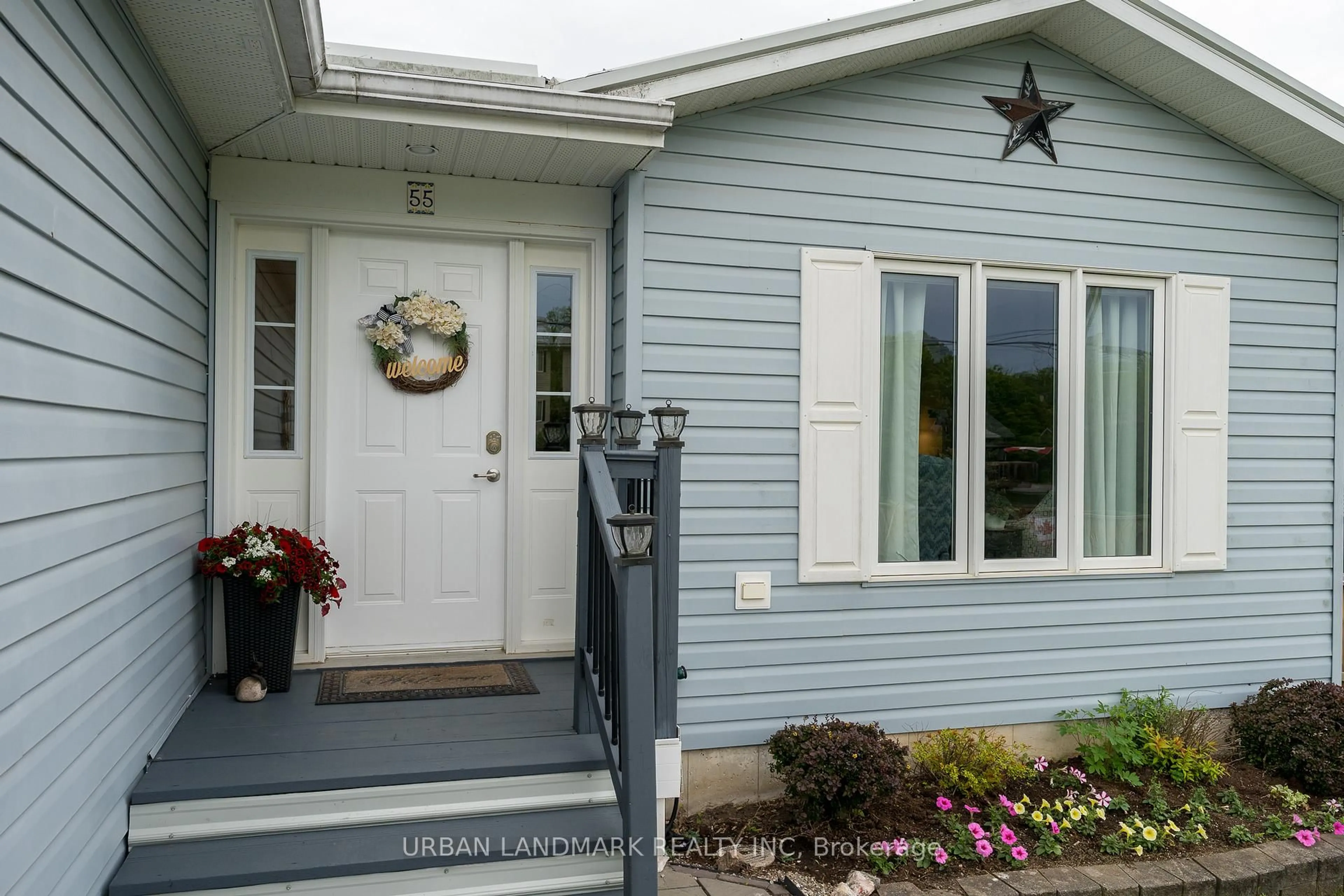 Home with vinyl exterior material, street for 55 Seymour St, Madoc Ontario K0K 2K0