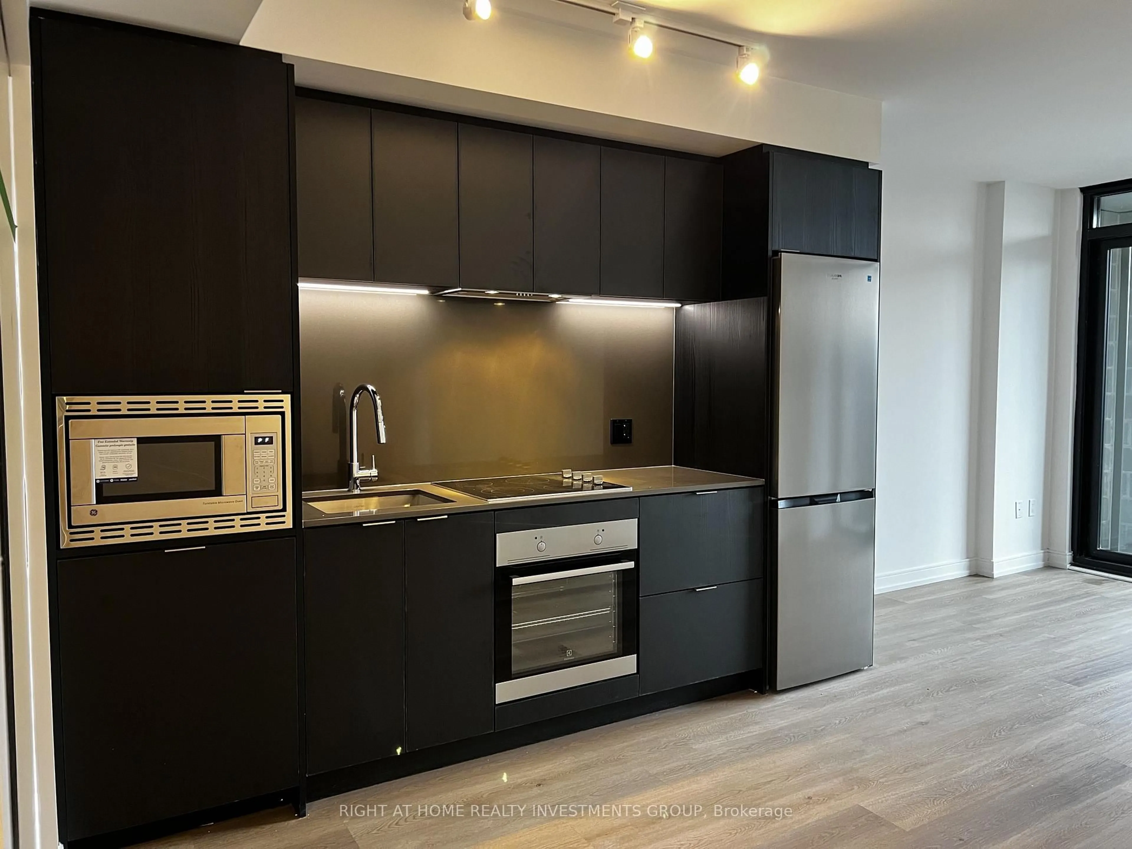 Standard kitchen, wood/laminate floor for 1 Jarvis St #327, Hamilton Ontario L8R 3J2