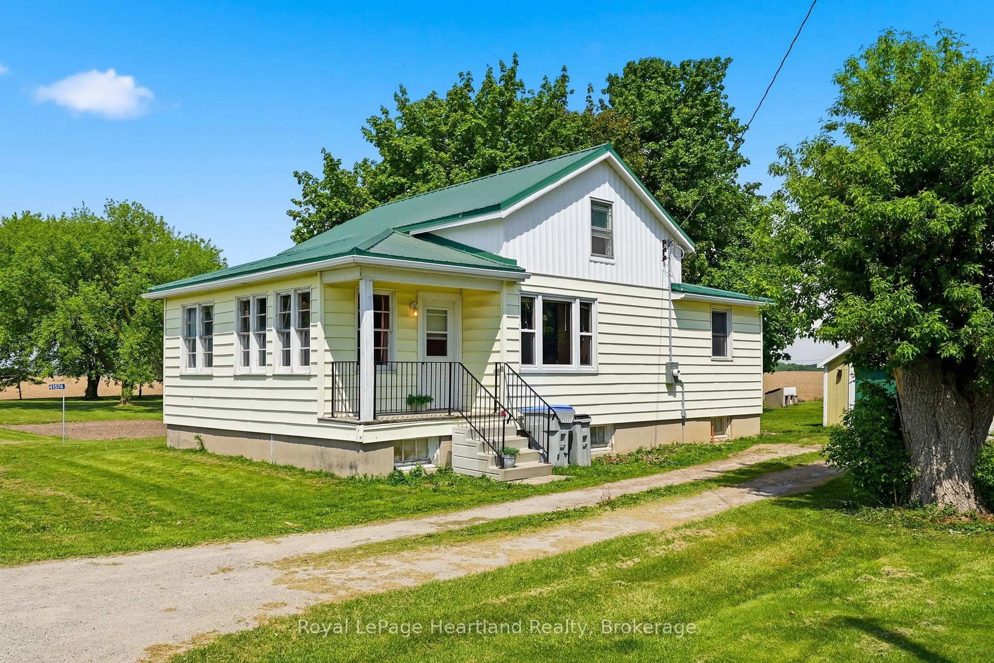 Home with vinyl exterior material, street for 41574 Kirkton Rd, South Huron Ontario N0K 2A0
