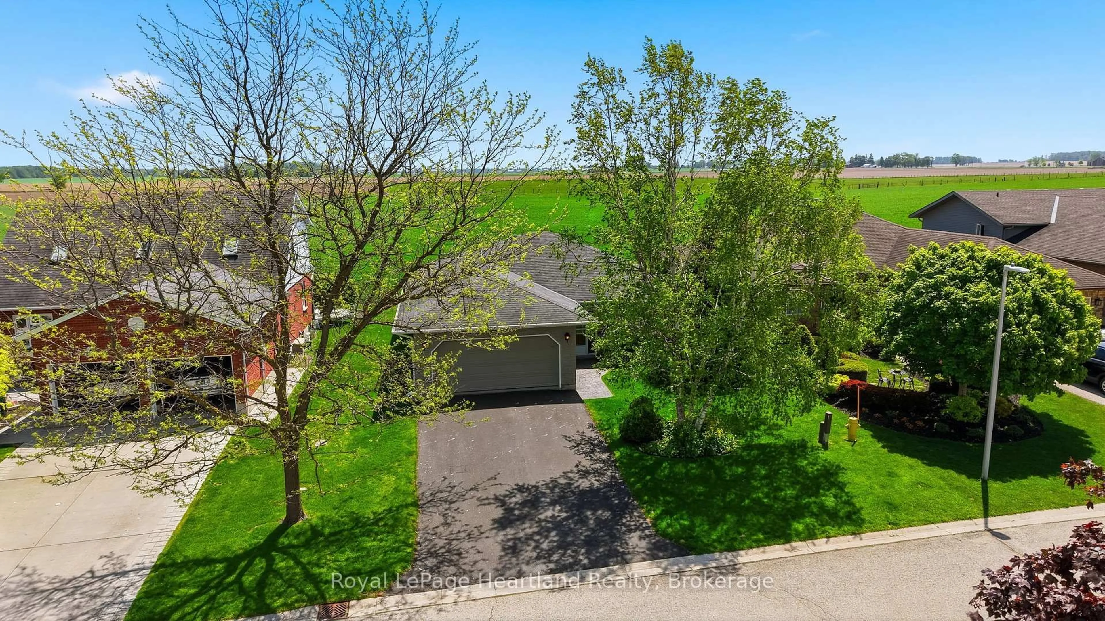 A pic from outside/outdoor area/front of a property/back of a property/a pic from drone, street for 580 Maple Ave, North Perth Ontario N4W 3G5