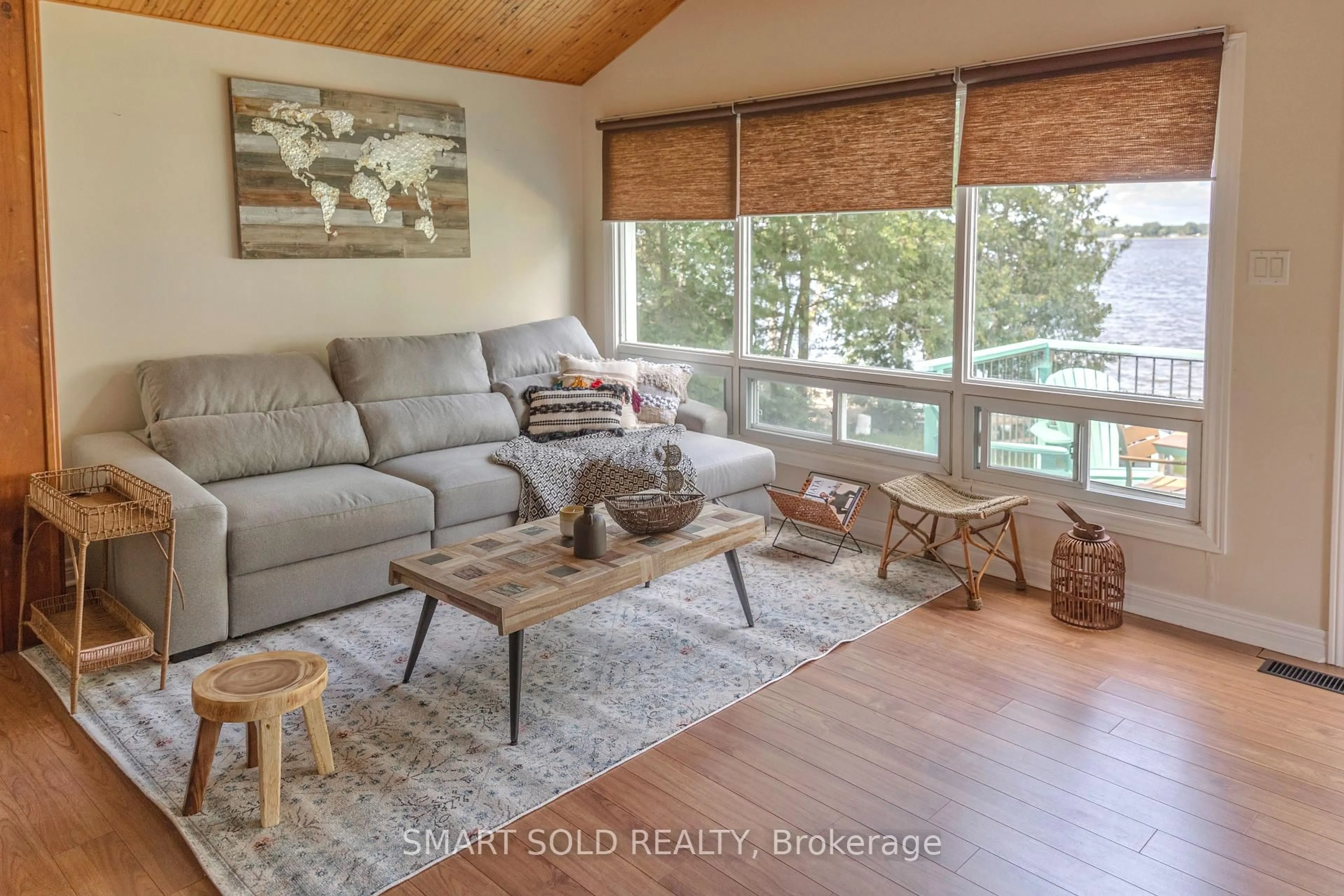 Living room with furniture, wood/laminate floor for 95 Campbell Beach Rd, Kawartha Lakes Ontario L0K 1B0