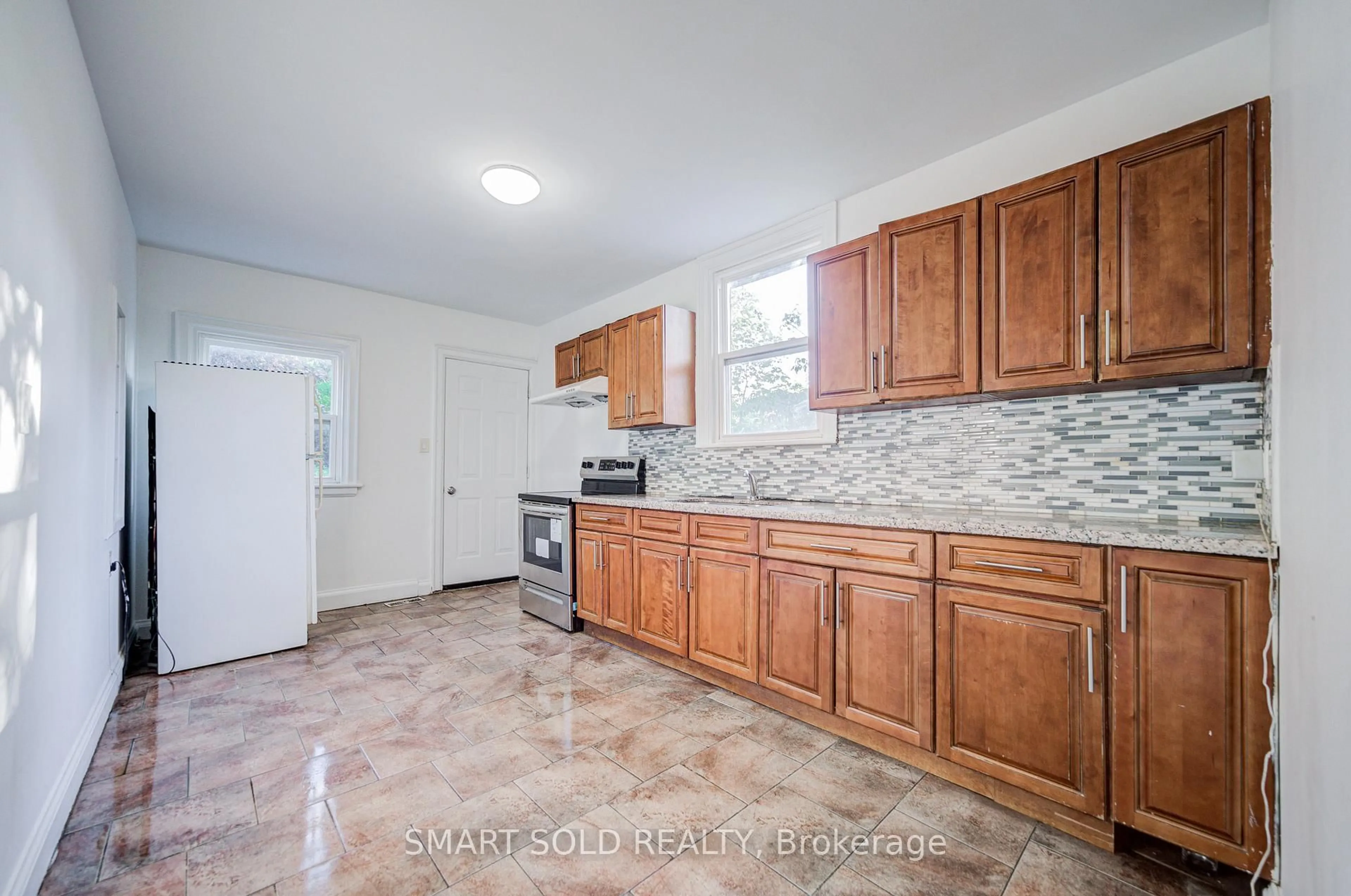 Standard kitchen, ceramic/tile floor for 77 Fennell Ave, Hamilton Ontario L9C 1E8