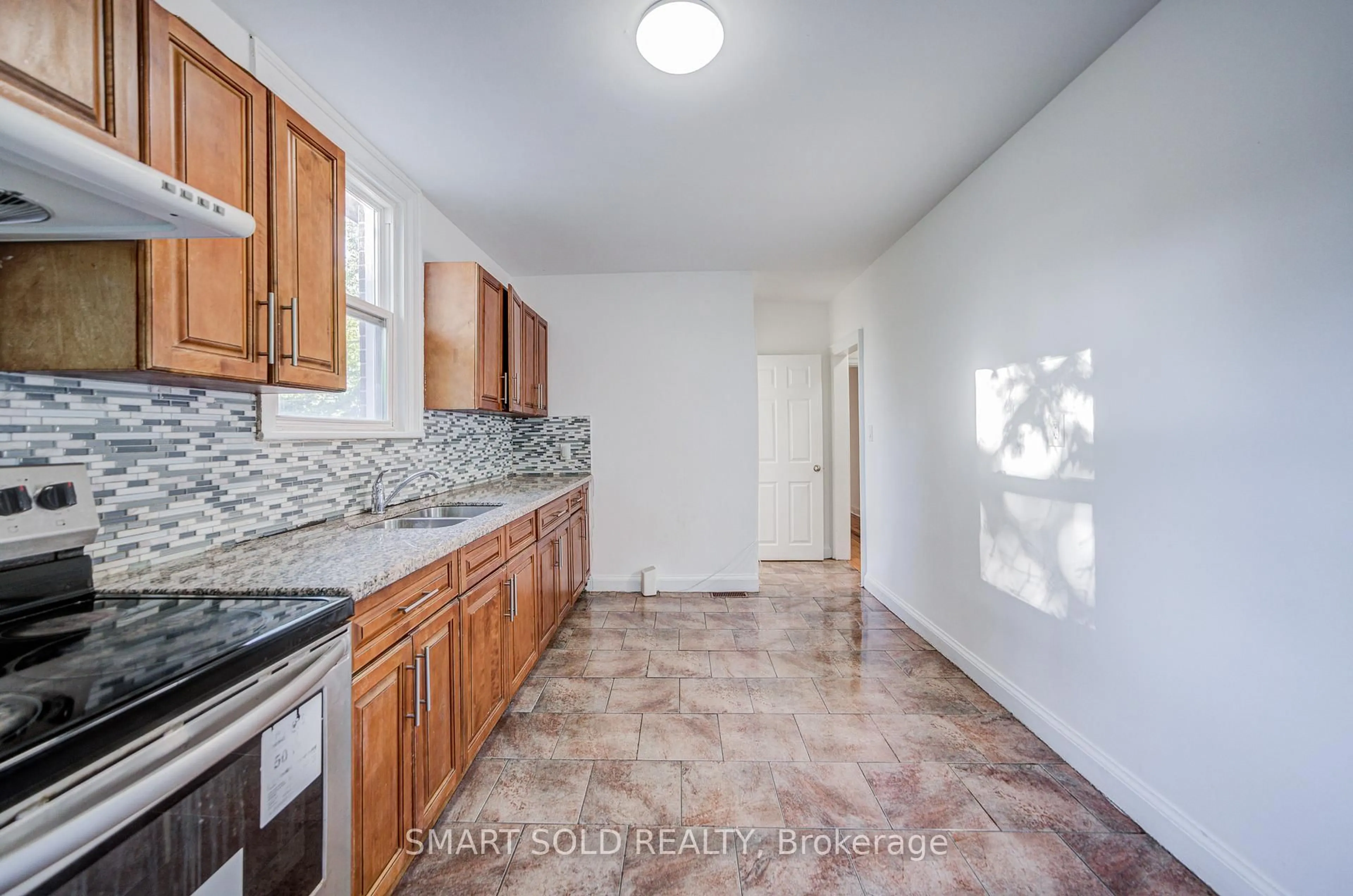 Standard kitchen, ceramic/tile floor for 77 Fennell Ave, Hamilton Ontario L9C 1E8