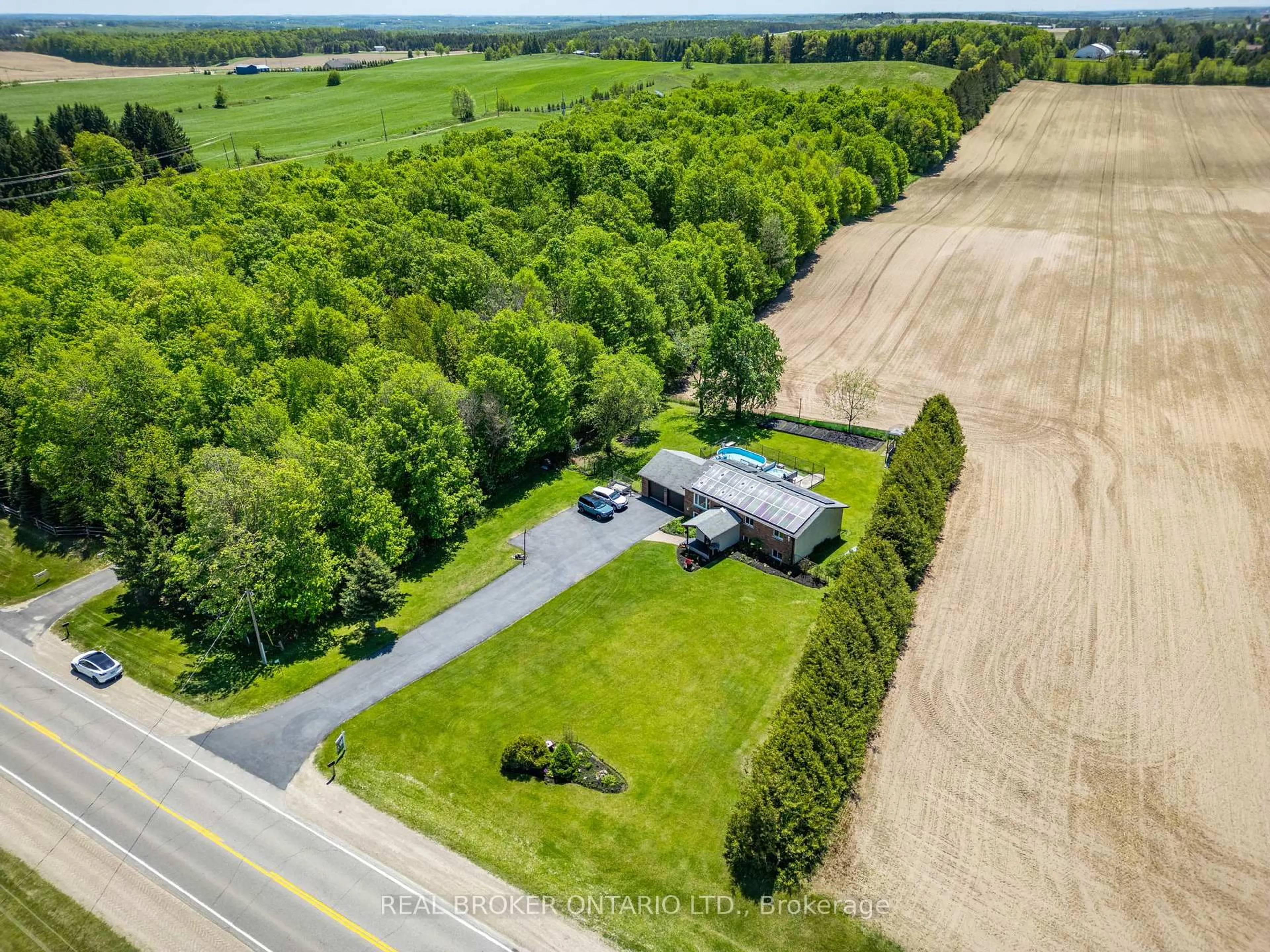 A pic from outside/outdoor area/front of a property/back of a property/a pic from drone, forest/trees view for 6022 Trafalgar Rd, Erin Ontario L0N 1N0