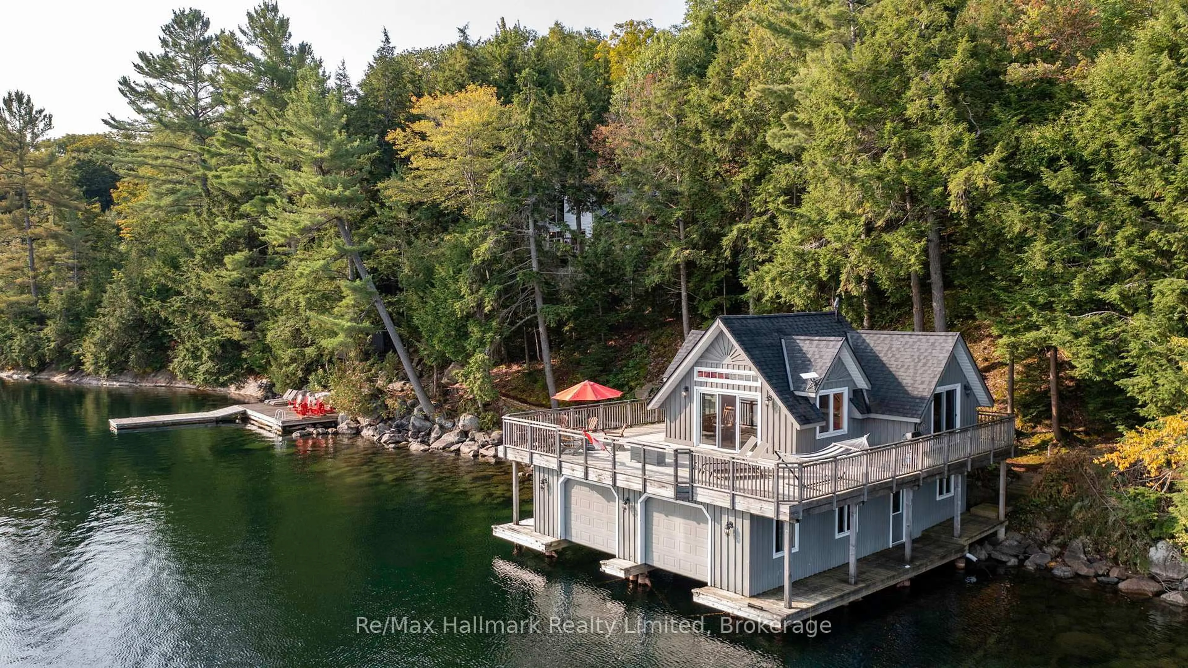 A pic from outside/outdoor area/front of a property/back of a property/a pic from drone, water/lake/river/ocean view for 1558-35 Fish Hatchery Rd, Muskoka Lakes Ontario P0B 1M0