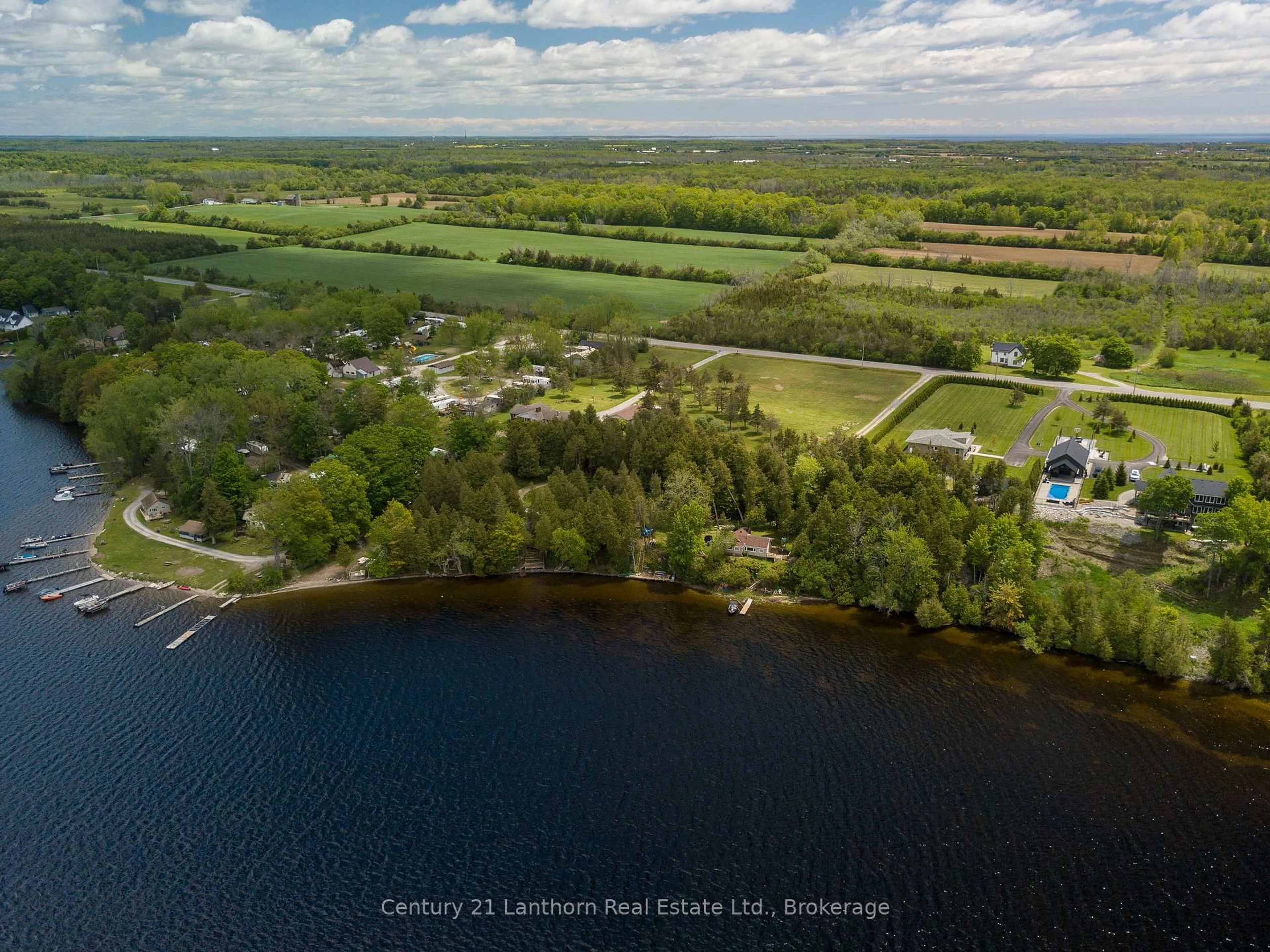 A pic from outside/outdoor area/front of a property/back of a property/a pic from drone, water/lake/river/ocean view for 47 Blossom Lane, Prince Edward County Ontario K0K 1T0