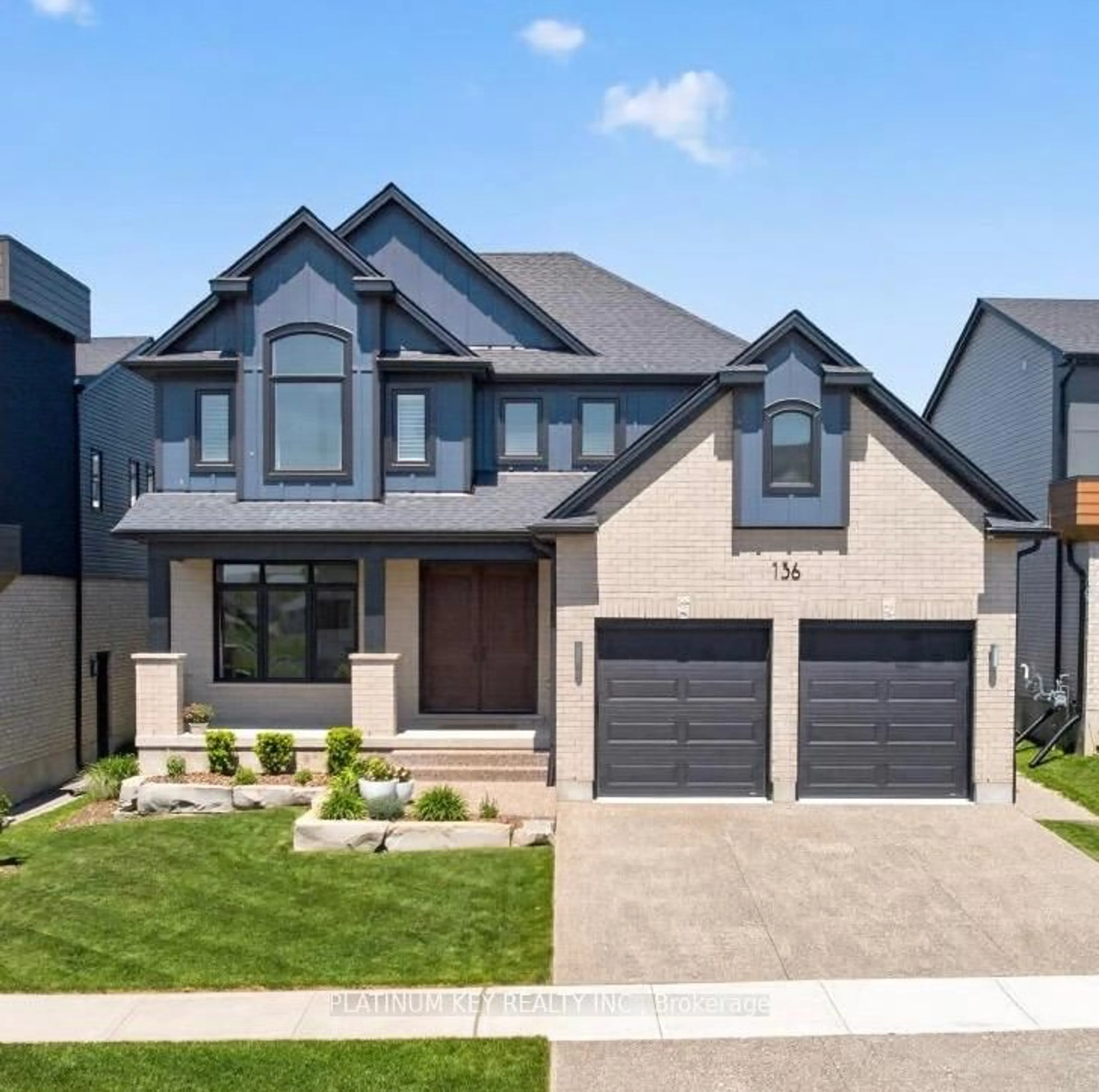 Home with brick exterior material, street for 136 Daventry Way, Middlesex Centre Ontario N0L 1R0