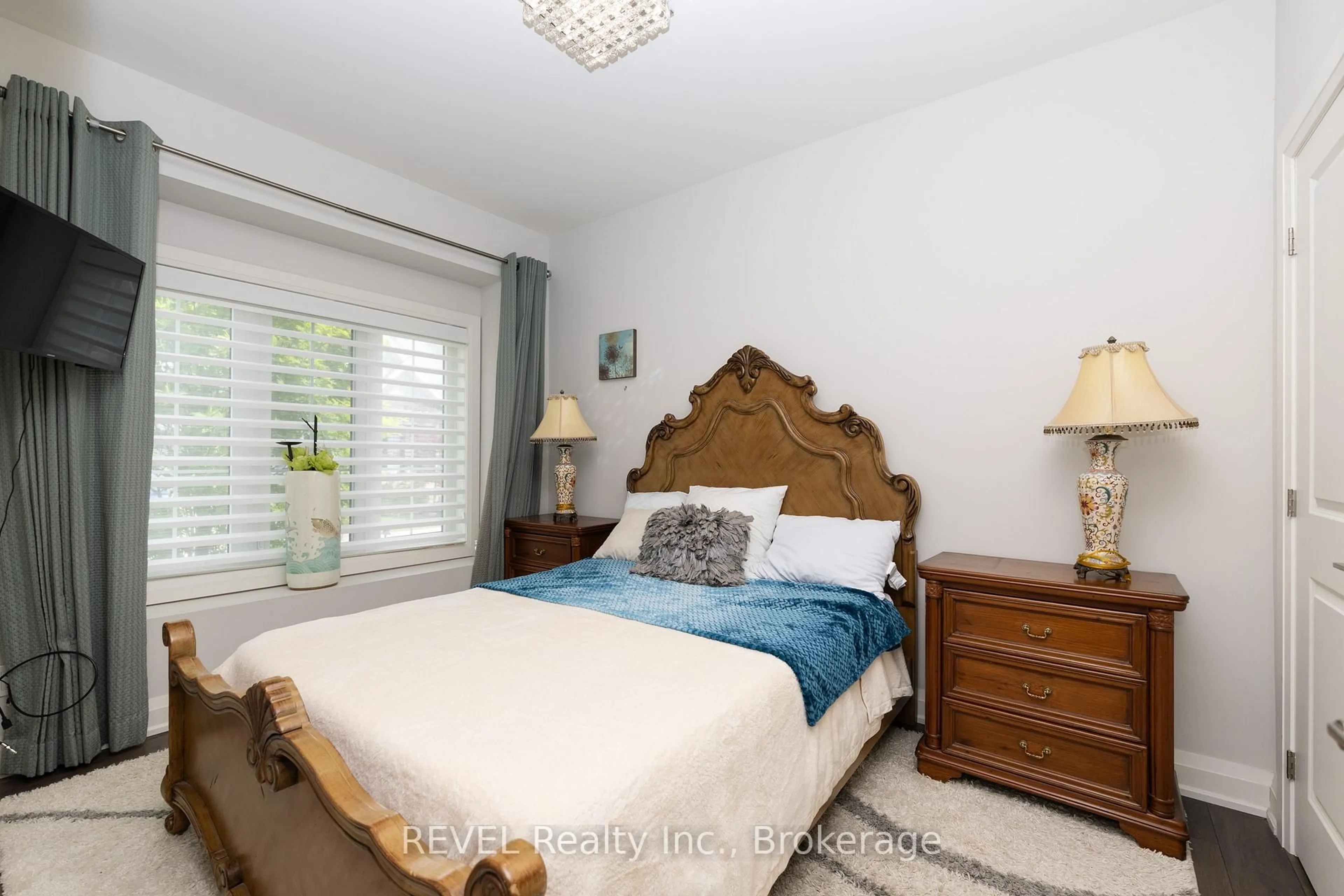 Bedroom with bed, wood/laminate floor for 5622 Ironwood St #12, Niagara Falls Ontario L2H 0M5
