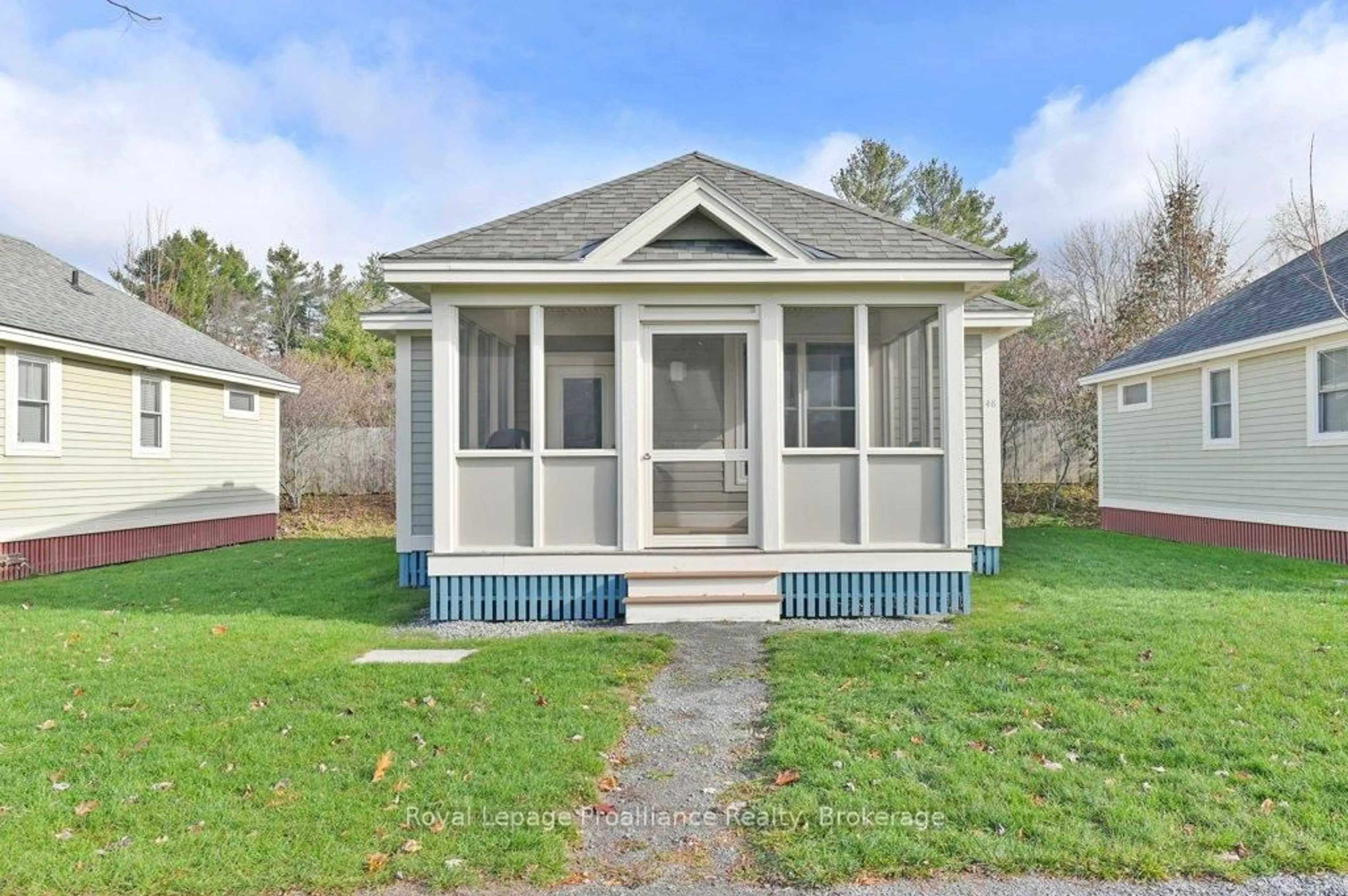 Home with vinyl exterior material, street for 48 Meadow View Lane, Prince Edward County Ontario K0K 1P0