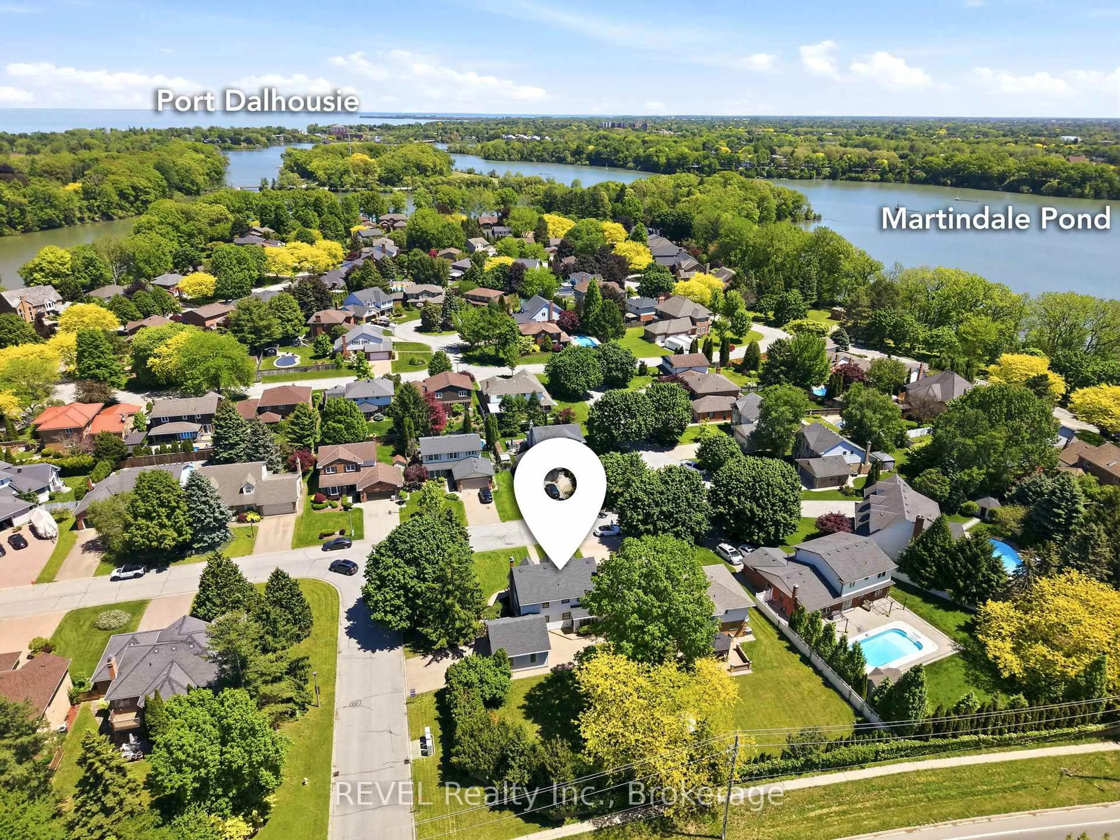 A pic from outside/outdoor area/front of a property/back of a property/a pic from drone, water/lake/river/ocean view for 15 Macintosh Cres, St. Catharines Ontario L2N 7M1