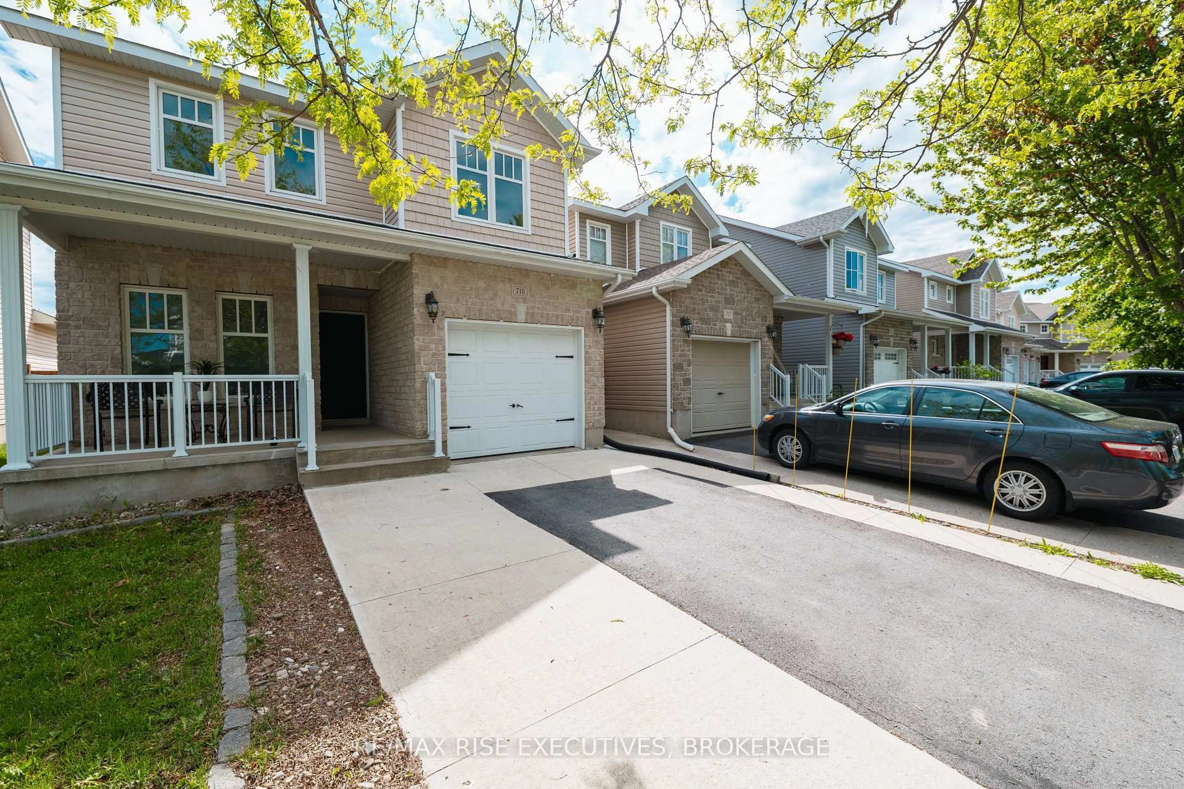 A pic from outside/outdoor area/front of a property/back of a property/a pic from drone, street for 710 Margaret Way, Kingston Ontario K7K 0B9