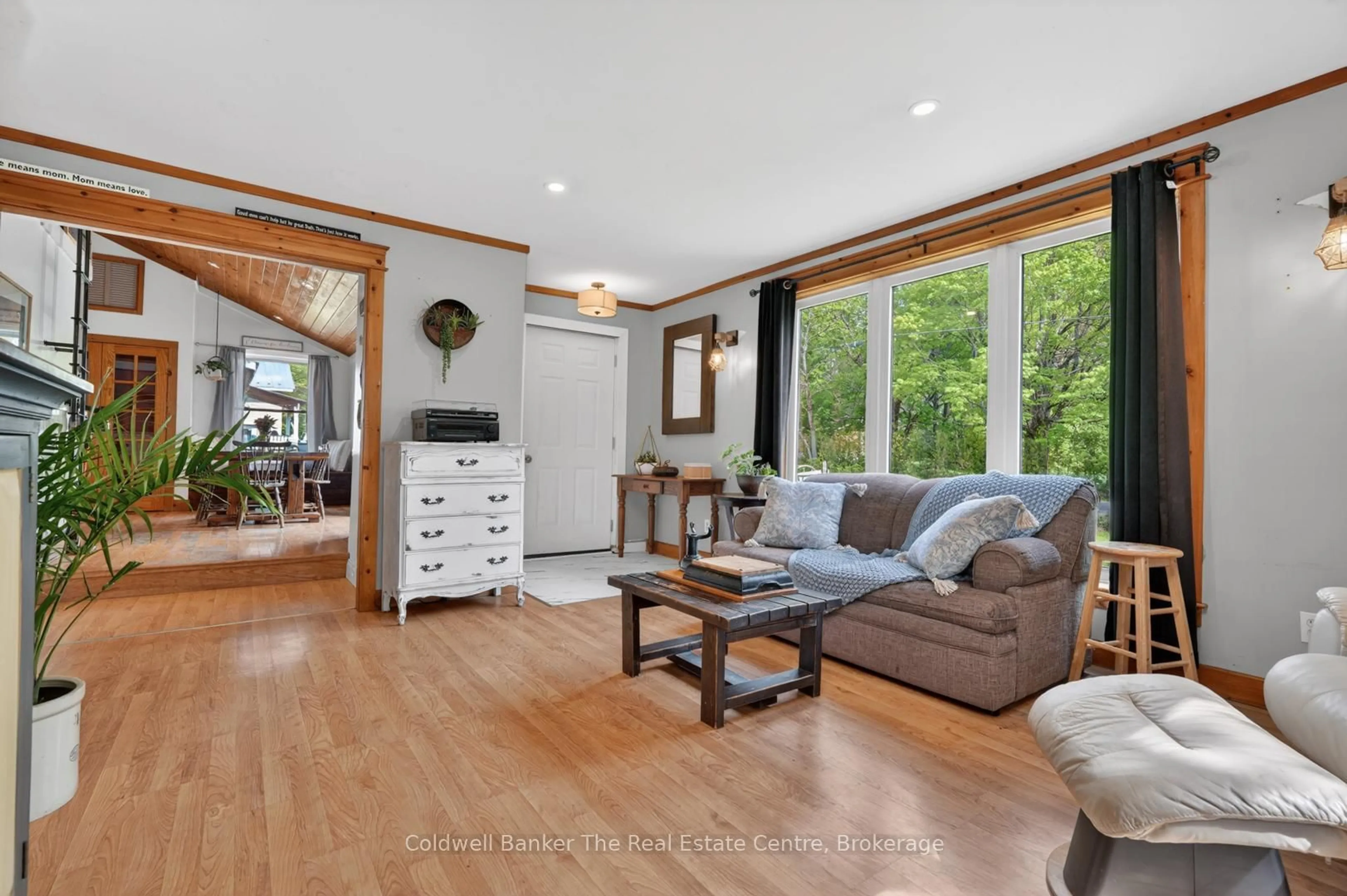 Living room with furniture, wood/laminate floor for 1635 Germania Rd, Bracebridge Ontario P1L 1X3