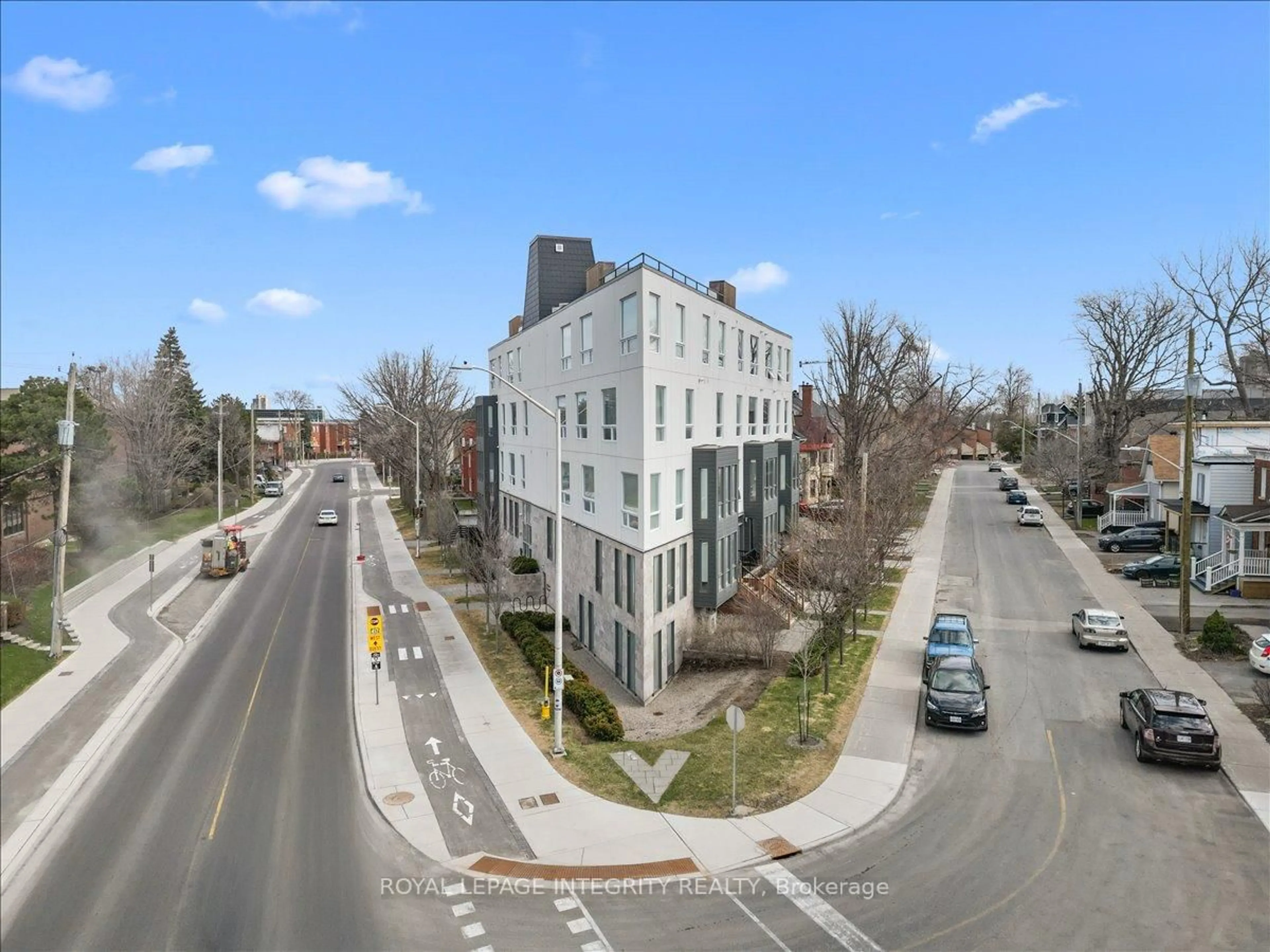 A pic from outside/outdoor area/front of a property/back of a property/a pic from drone, street for 150 Greenfield Ave #204, Ottawa Ontario K1S 0X8