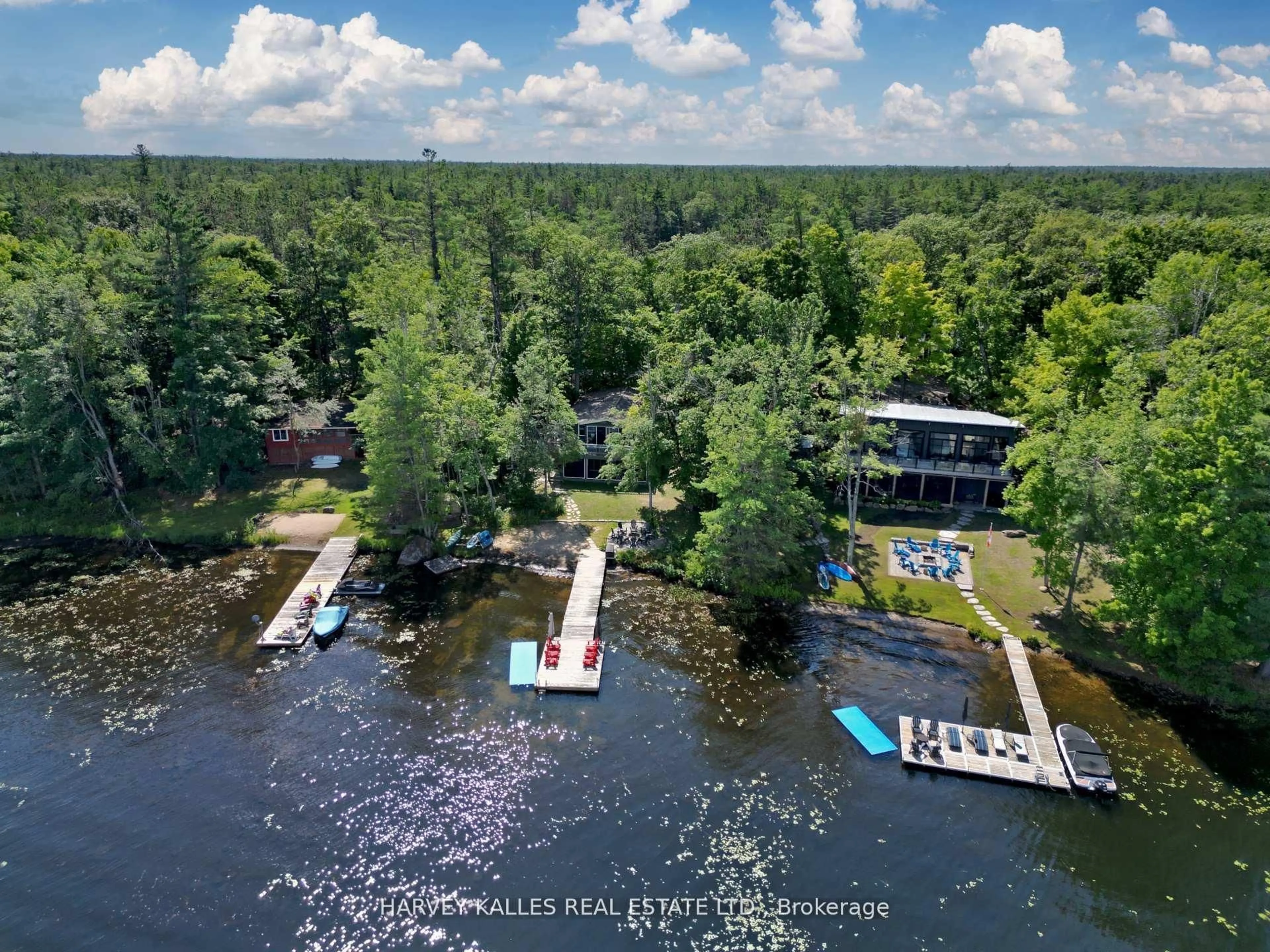 A pic from outside/outdoor area/front of a property/back of a property/a pic from drone, water/lake/river/ocean view for 83 Pinetree Rd, Gravenhurst Ontario P1P 1R2