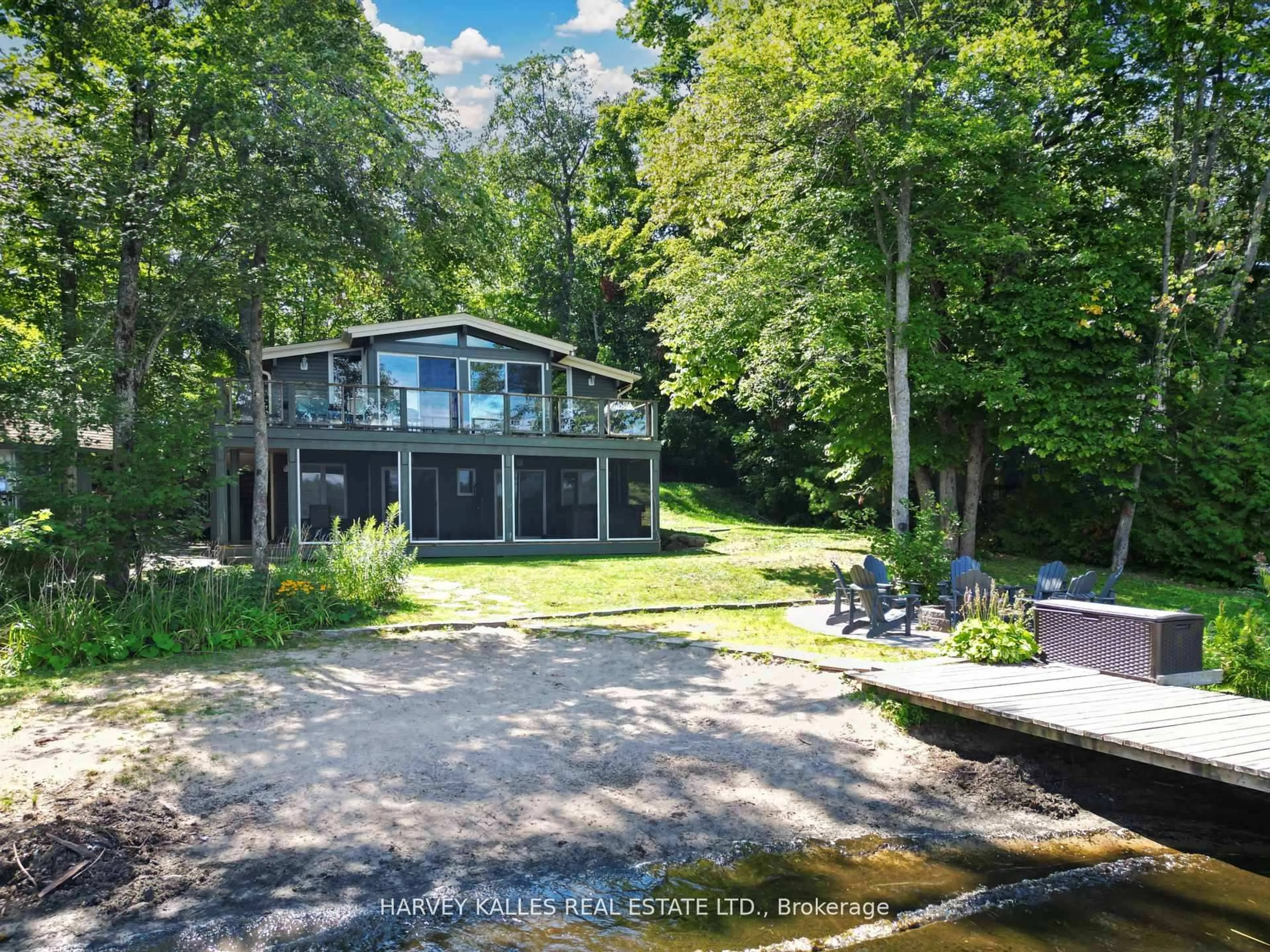 A pic from outside/outdoor area/front of a property/back of a property/a pic from drone, water/lake/river/ocean view for 83 Pinetree Rd, Gravenhurst Ontario P1P 1R2