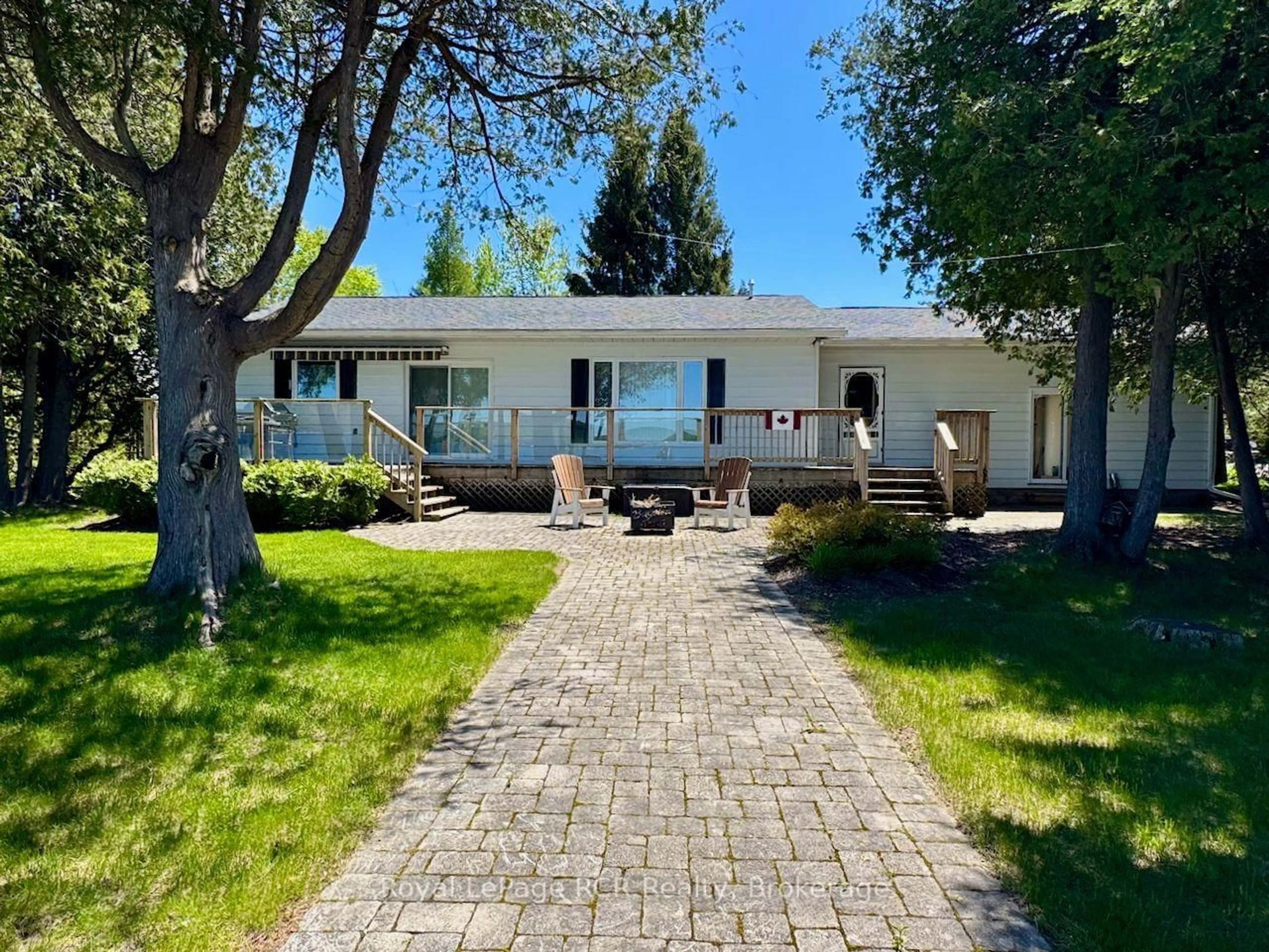 A pic from outside/outdoor area/front of a property/back of a property/a pic from drone, street for 502325 Grey Road 1 Rd, Georgian Bluffs Ontario N0H 2T0