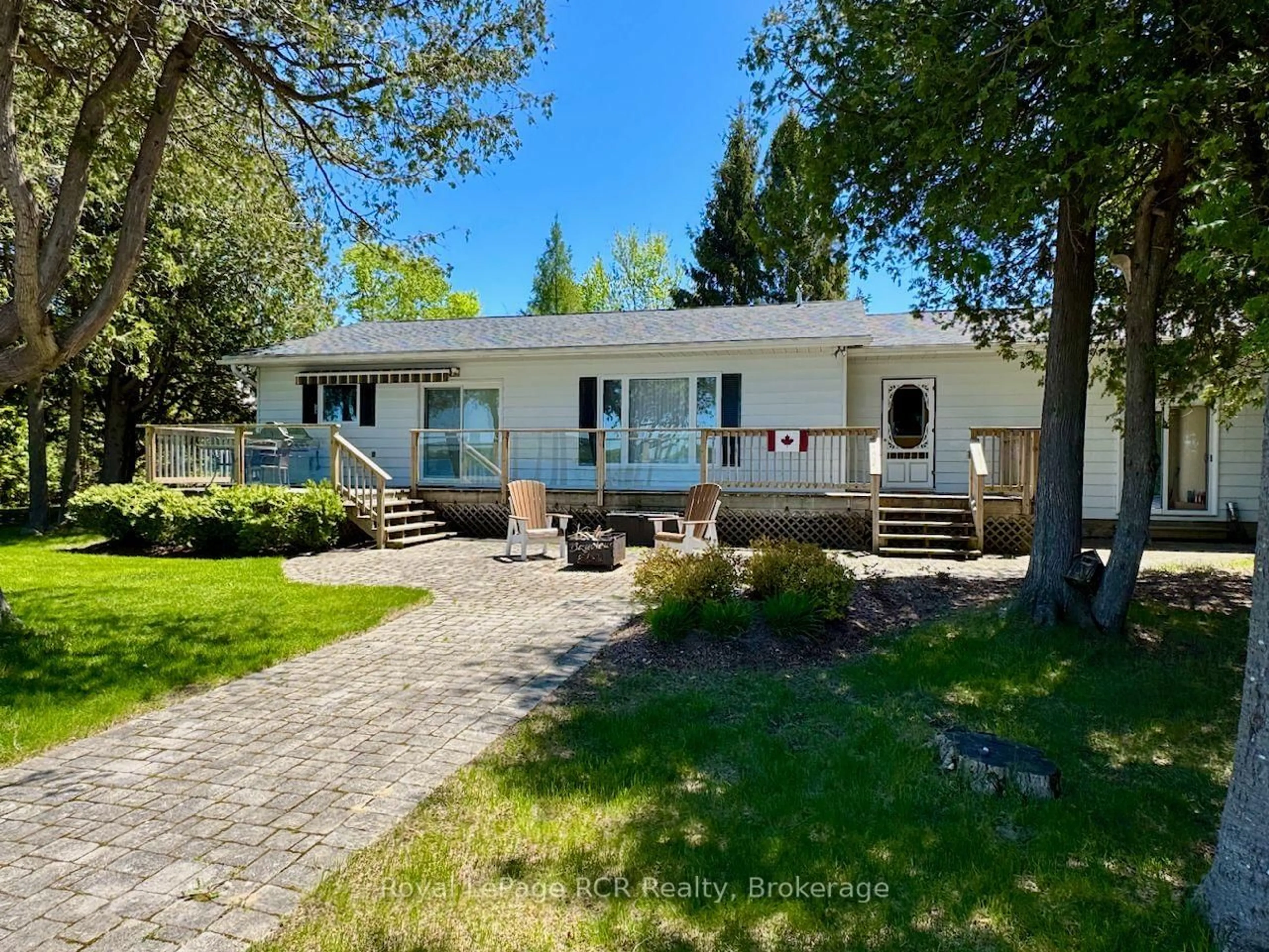 A pic from outside/outdoor area/front of a property/back of a property/a pic from drone, street for 502325 Grey Road 1 Rd, Georgian Bluffs Ontario N0H 2T0