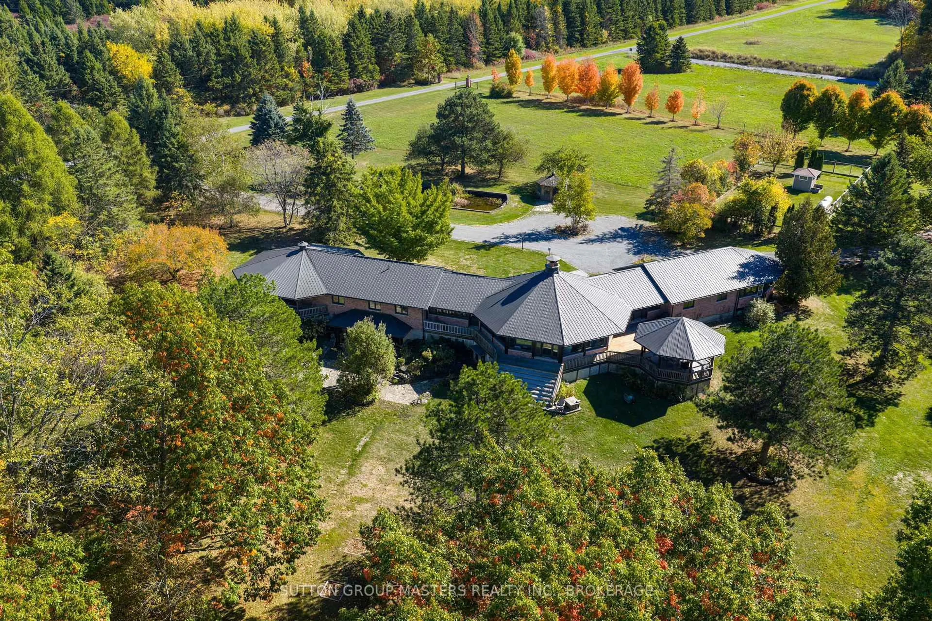 A pic from outside/outdoor area/front of a property/back of a property/a pic from drone, mountain view for 314 Baseline Rd, Gananoque Ontario K7G 2V6