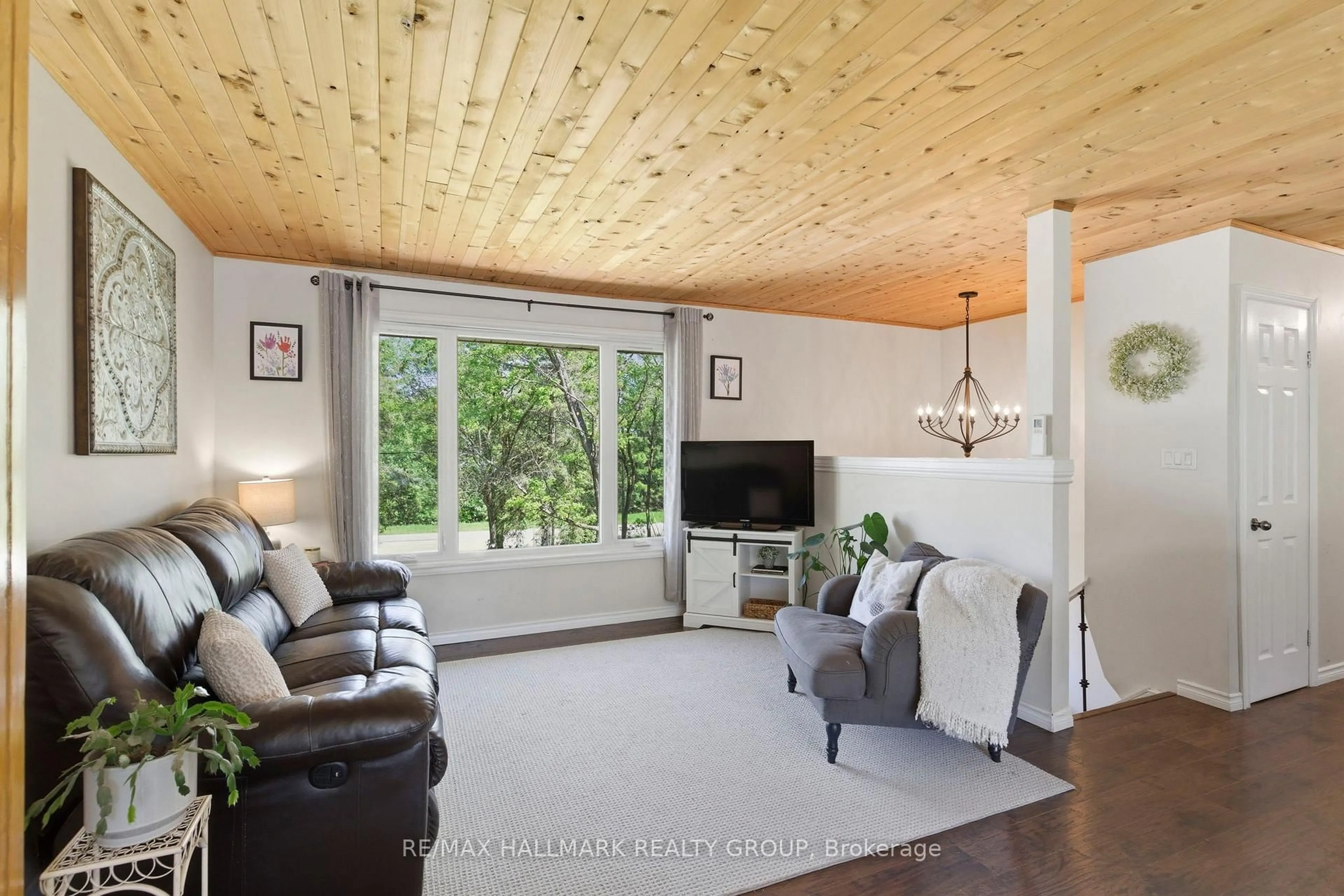 Living room with furniture, wood/laminate floor for 237 County Road 42 Rd, Leeds and the Thousand Islands Ontario K0E 1G0