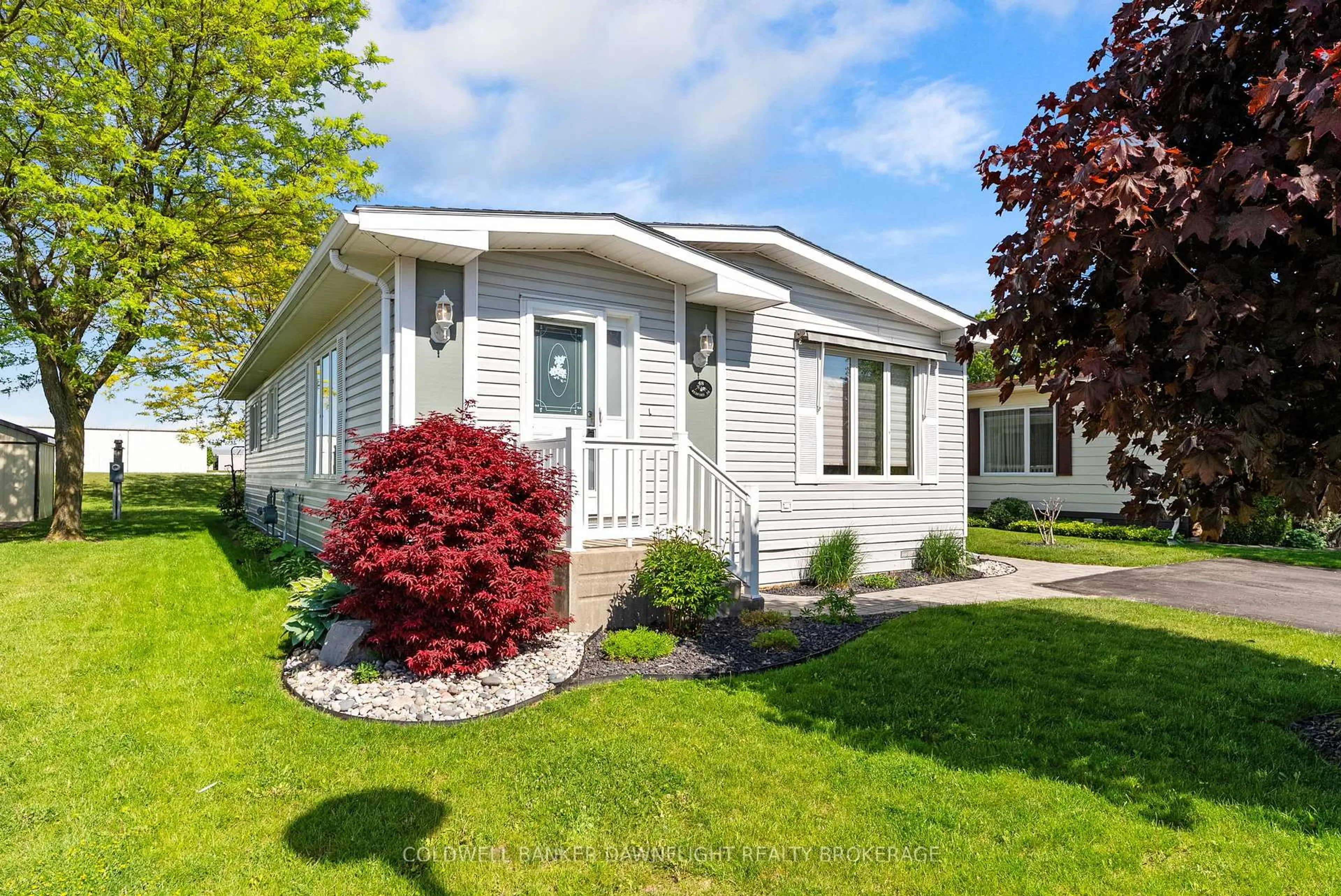 Home with vinyl exterior material, street for 48 Redford Dr, South Huron Ontario N0M 1S3