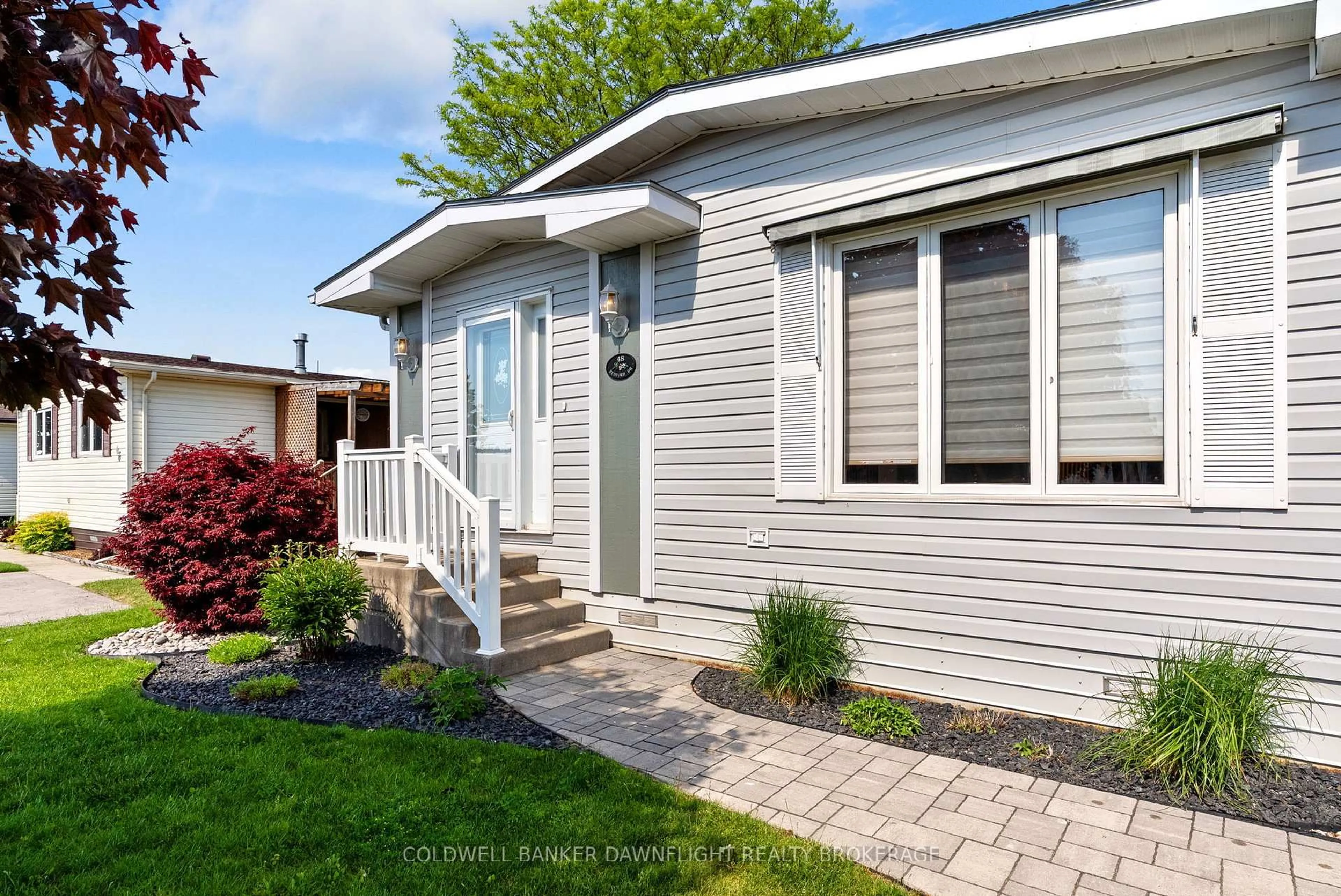 Home with vinyl exterior material, street for 48 Redford Dr, South Huron Ontario N0M 1S3