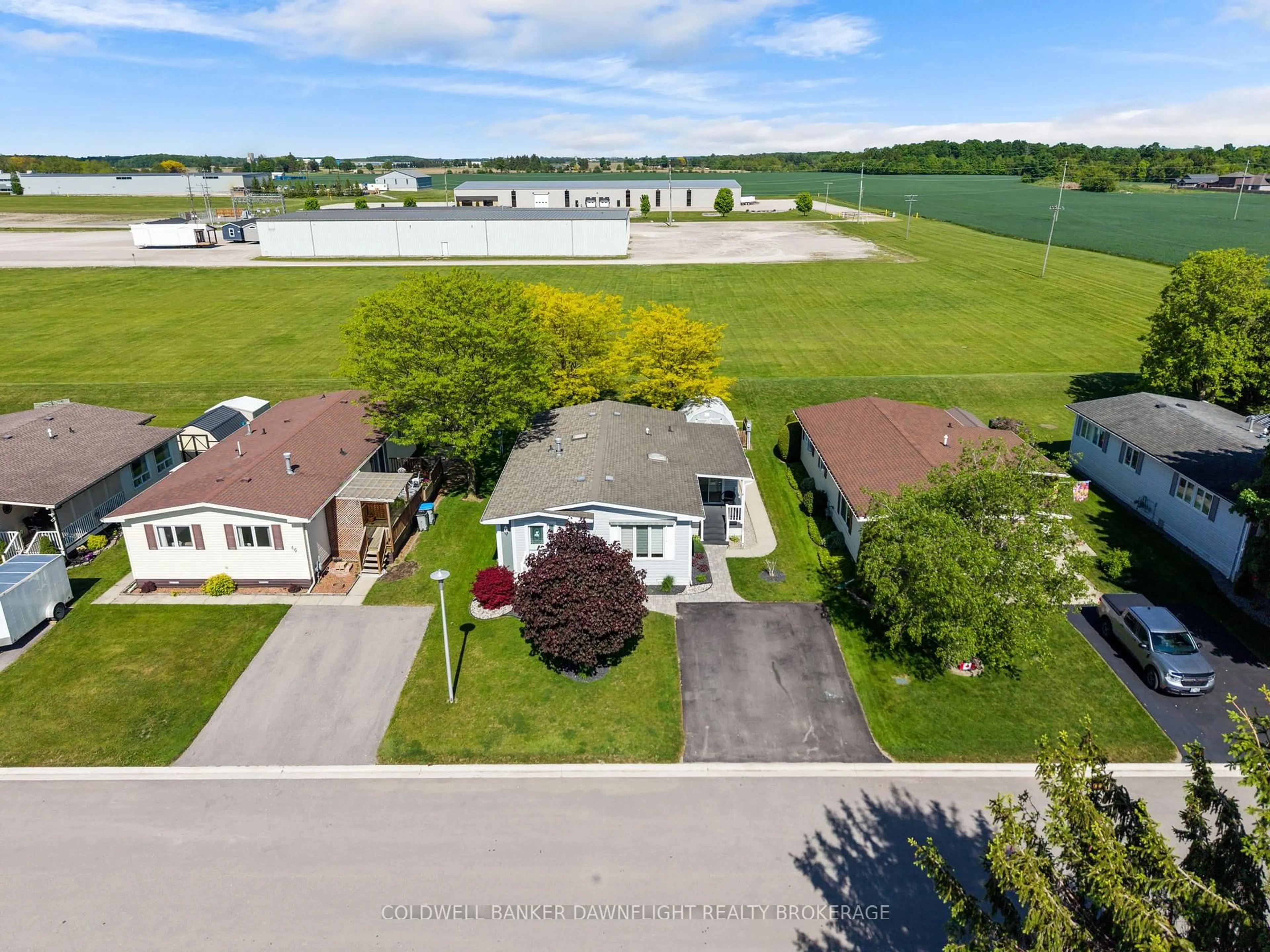A pic from outside/outdoor area/front of a property/back of a property/a pic from drone, water/lake/river/ocean view for 48 Redford Dr, South Huron Ontario N0M 1S3