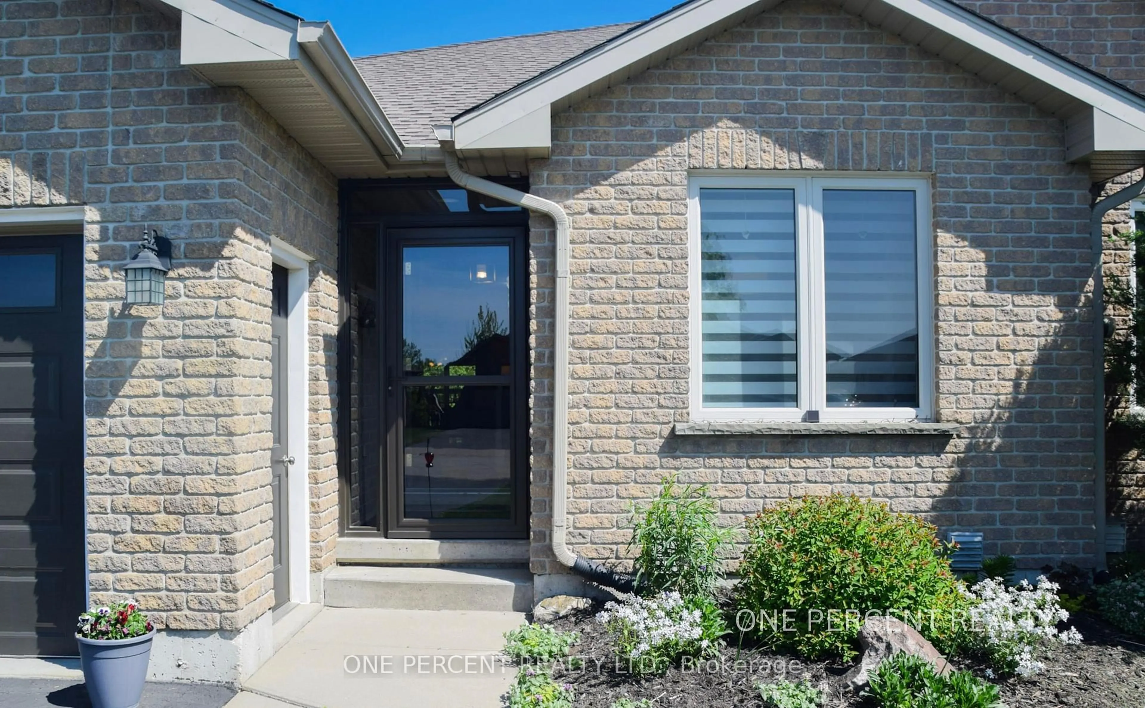 Home with brick exterior material, street for 110 MILTON SEILER Cres, Minto Ontario N0G 2P0