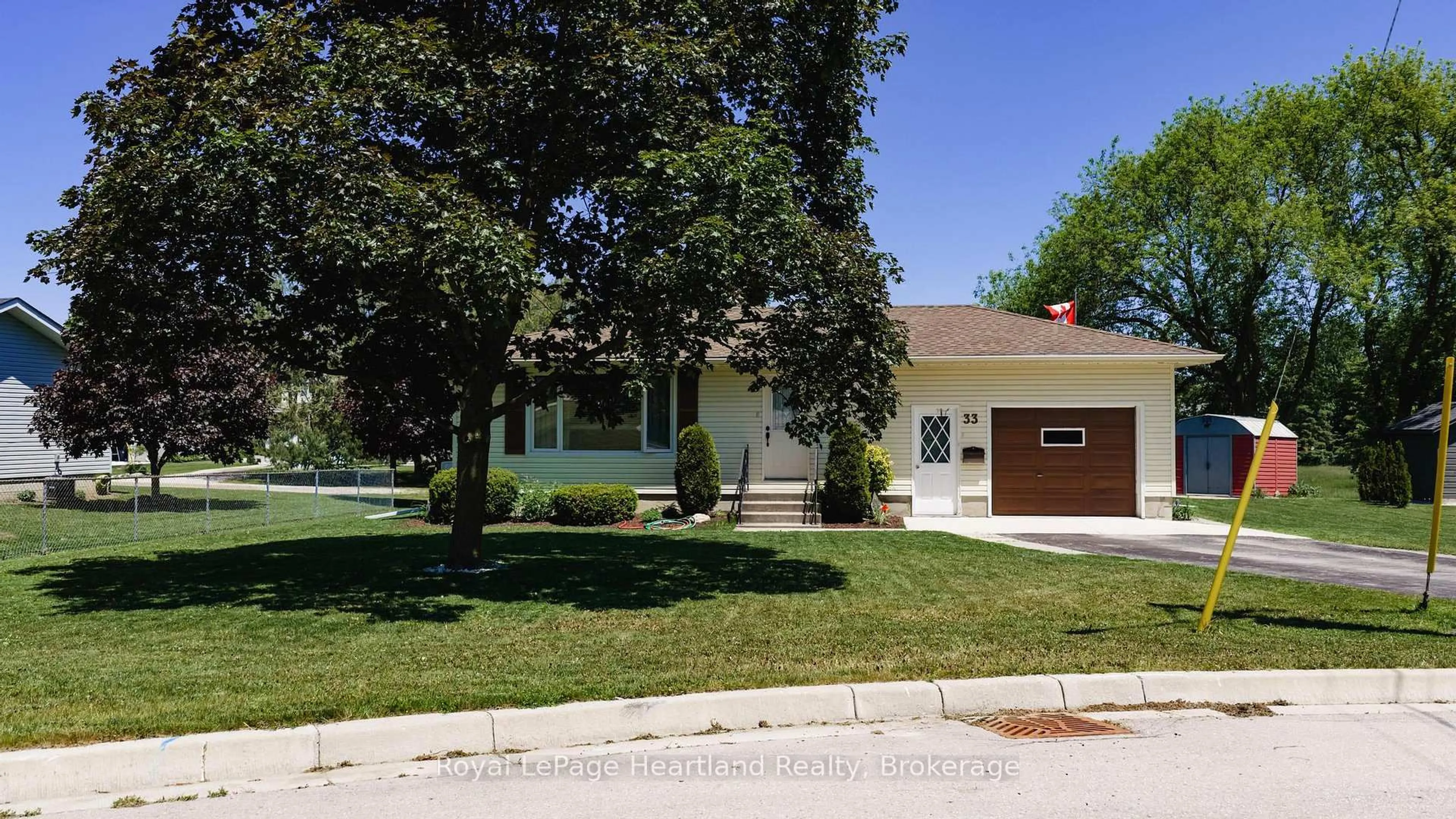Home with vinyl exterior material, street for 33 NORTH St, Huron East Ontario N0K 1G0