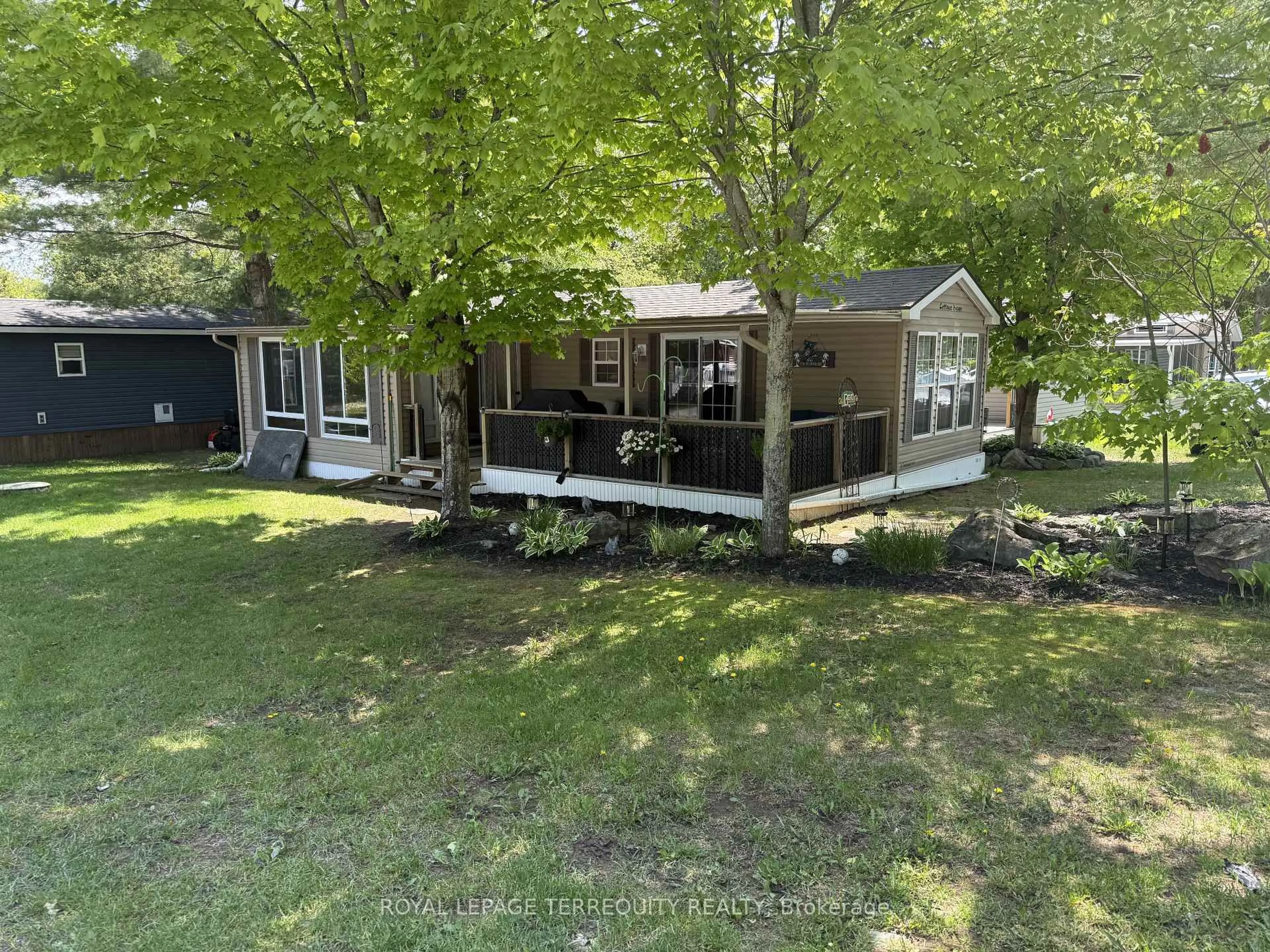 A pic from outside/outdoor area/front of a property/back of a property/a pic from drone, water/lake/river/ocean view for 16 Rockhaven, Selwyn Ontario K0L 2H0