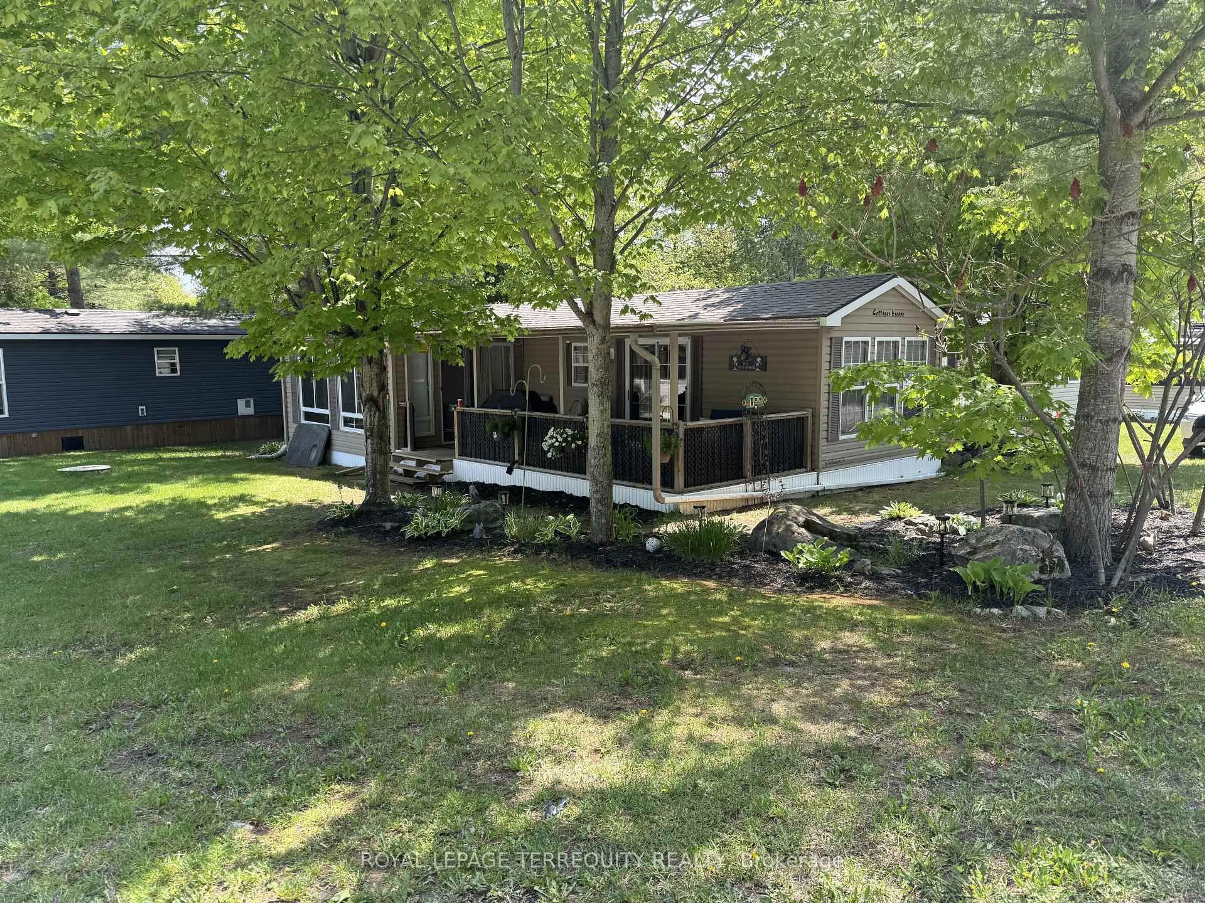 A pic from outside/outdoor area/front of a property/back of a property/a pic from drone, water/lake/river/ocean view for 16 Rockhaven, Selwyn Ontario K0L 2H0