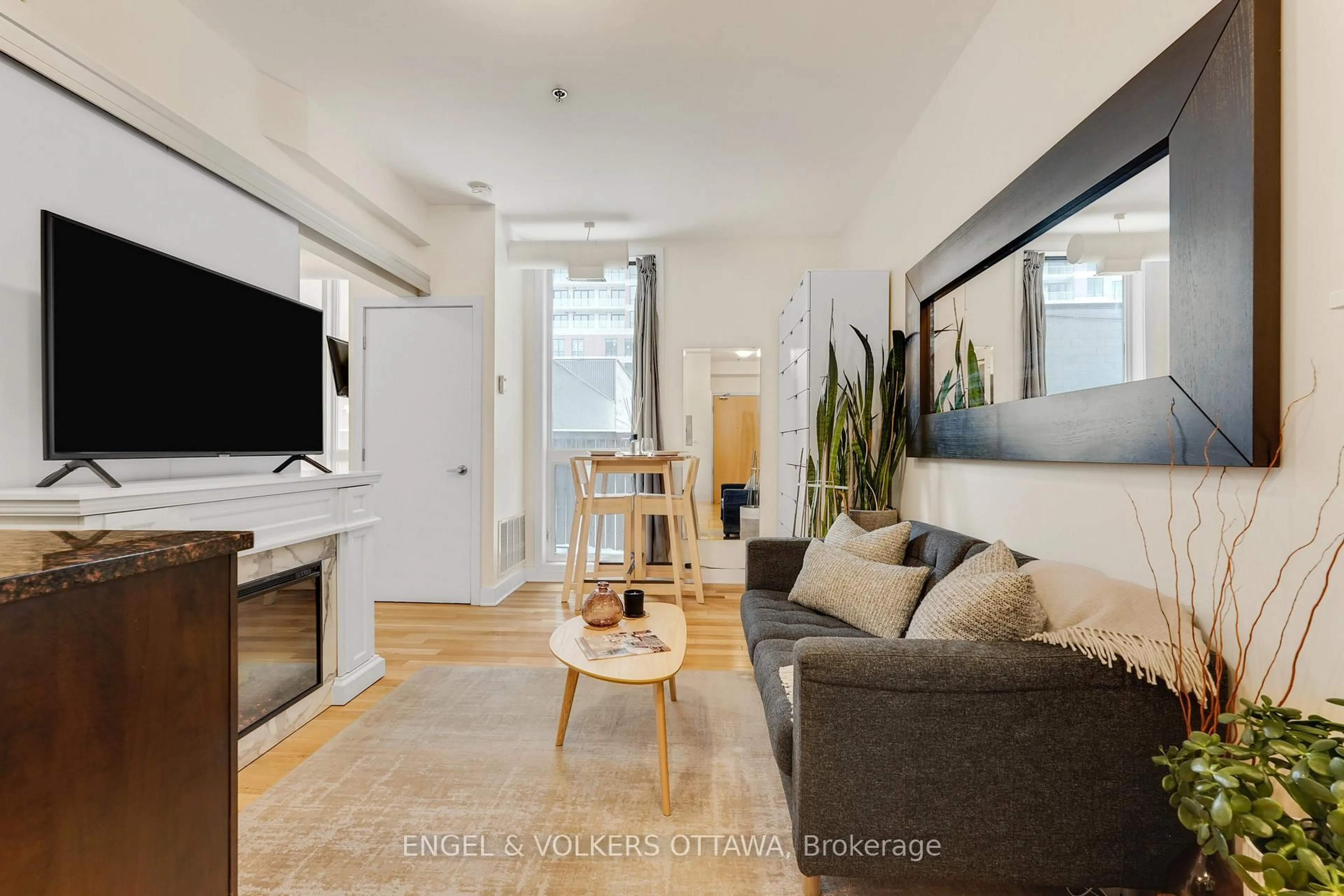Living room with furniture, unknown for 360 Cumberland St #104, Ottawa Ontario K1N 0B1
