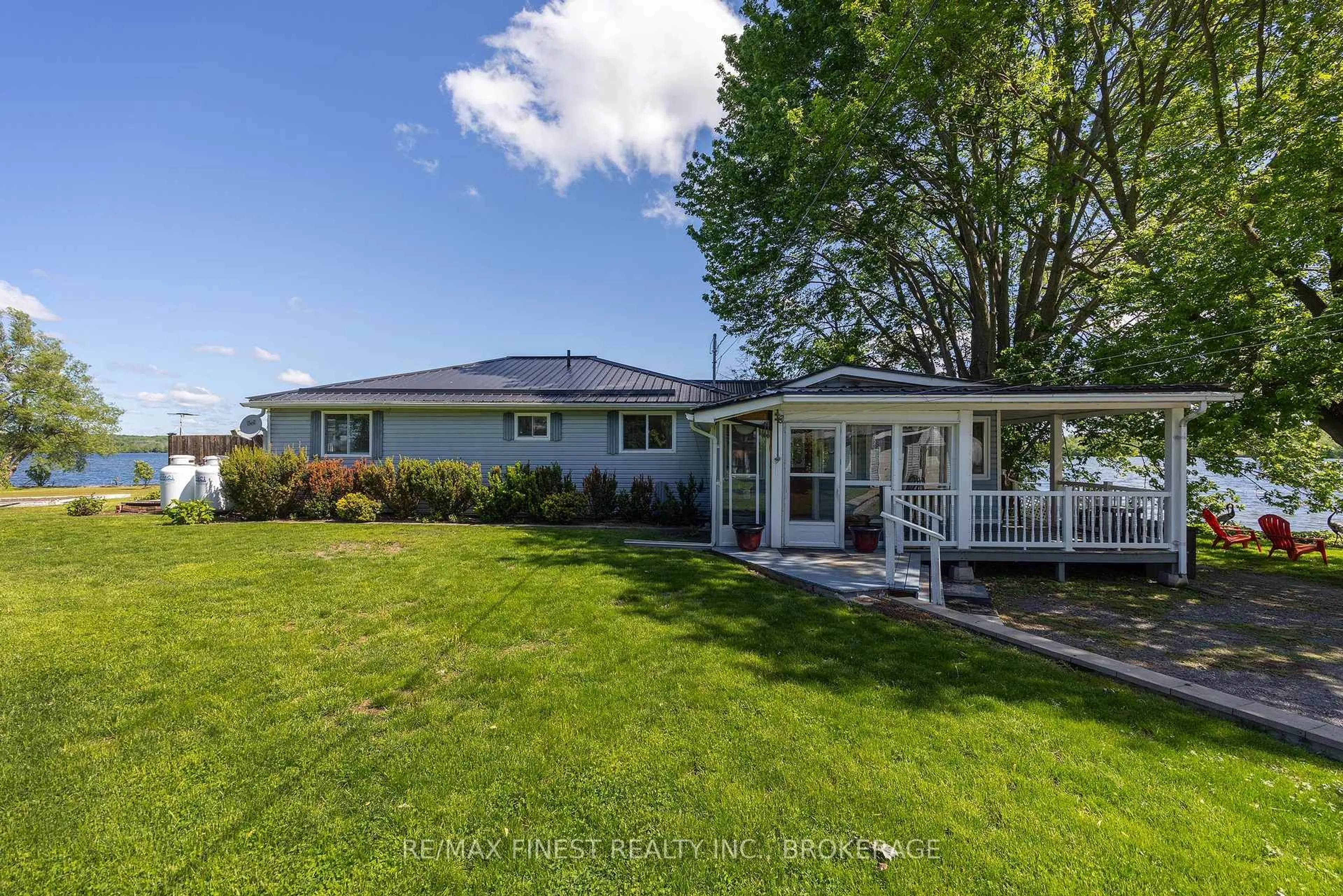 A pic from outside/outdoor area/front of a property/back of a property/a pic from drone, water/lake/river/ocean view for 881 River Styx Lane, Kingston Ontario K7L 4V3