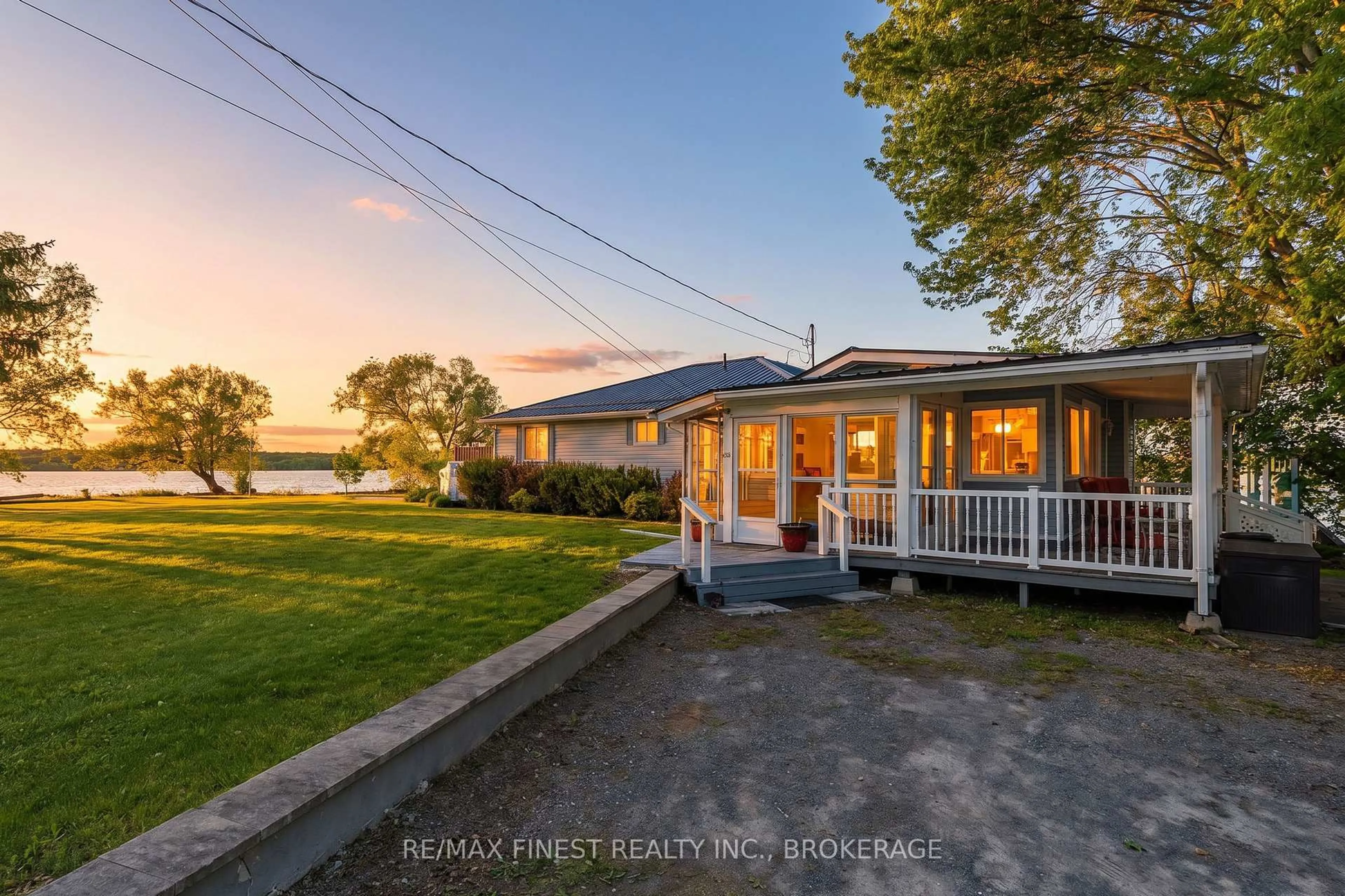 A pic from outside/outdoor area/front of a property/back of a property/a pic from drone, water/lake/river/ocean view for 881 River Styx Lane, Kingston Ontario K7L 4V3