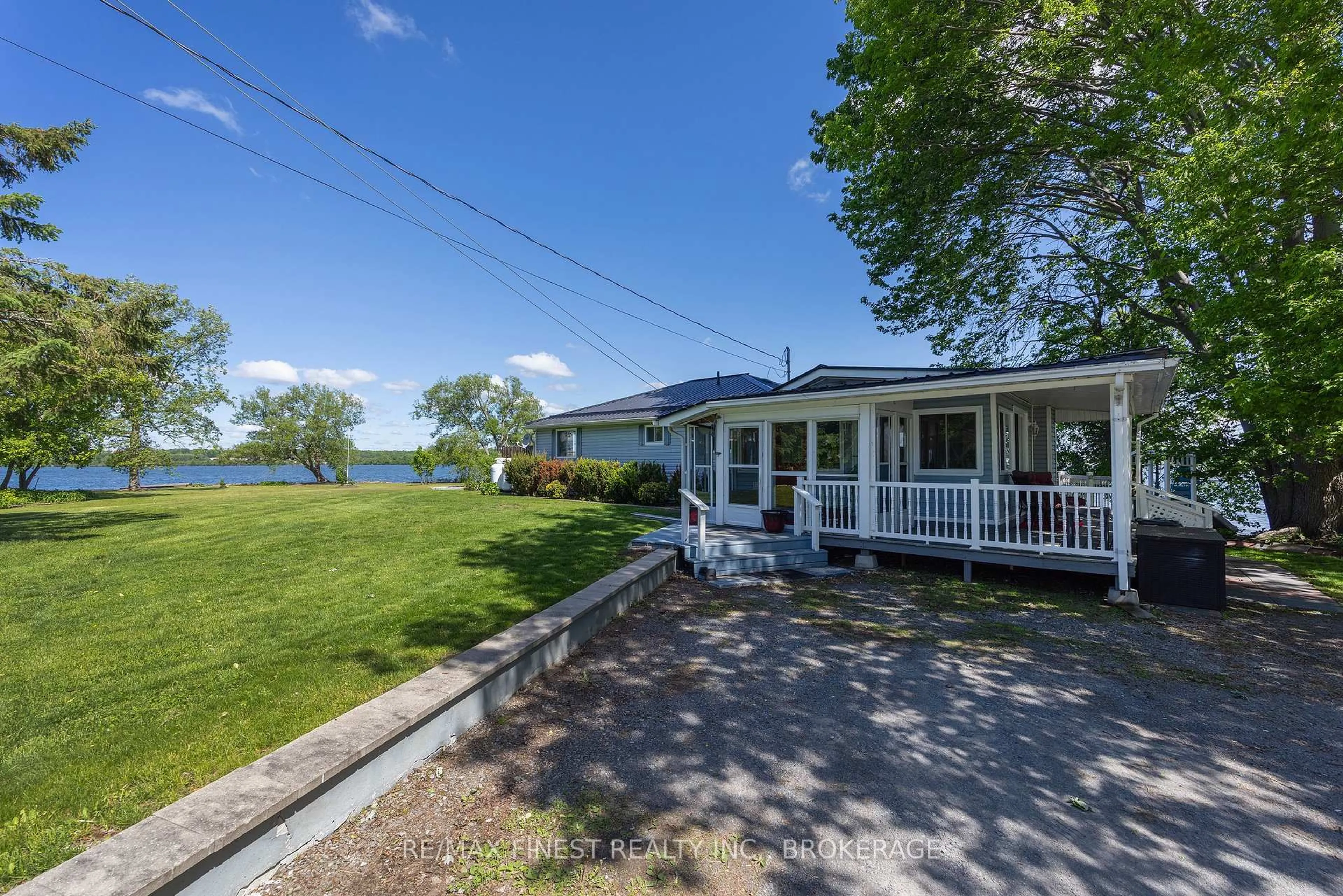 A pic from outside/outdoor area/front of a property/back of a property/a pic from drone, water/lake/river/ocean view for 881 River Styx Lane, Kingston Ontario K7L 4V3