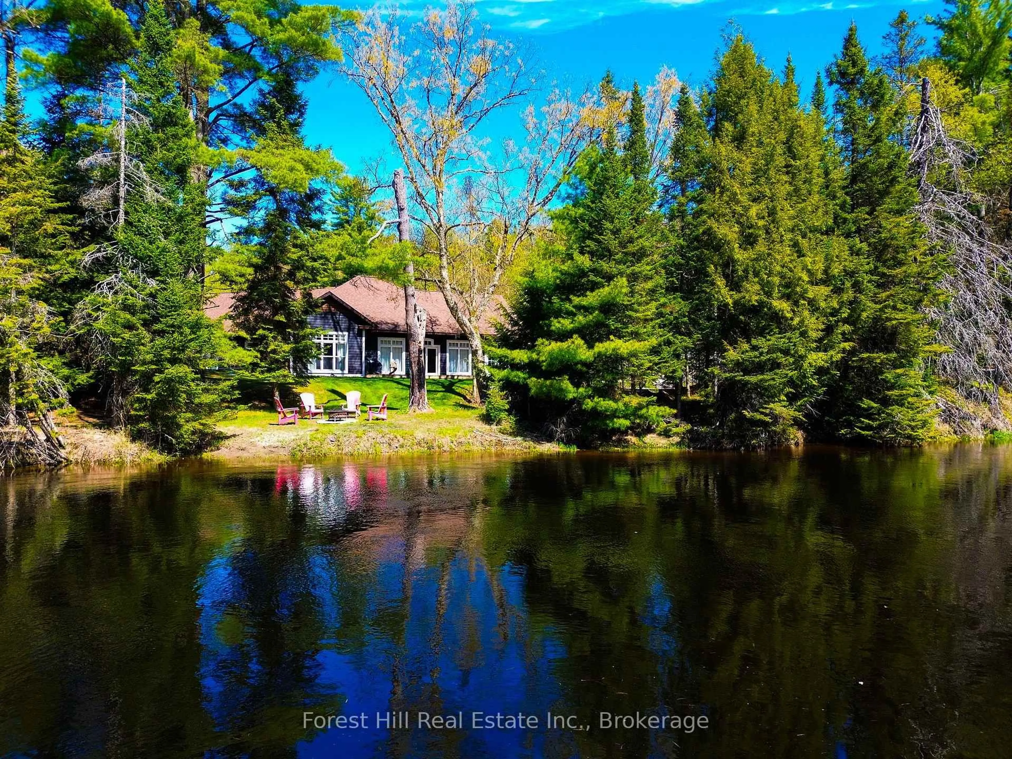 A pic from outside/outdoor area/front of a property/back of a property/a pic from drone, water/lake/river/ocean view for 1246 High Falls Rd, Bracebridge Ontario P1L 0L1