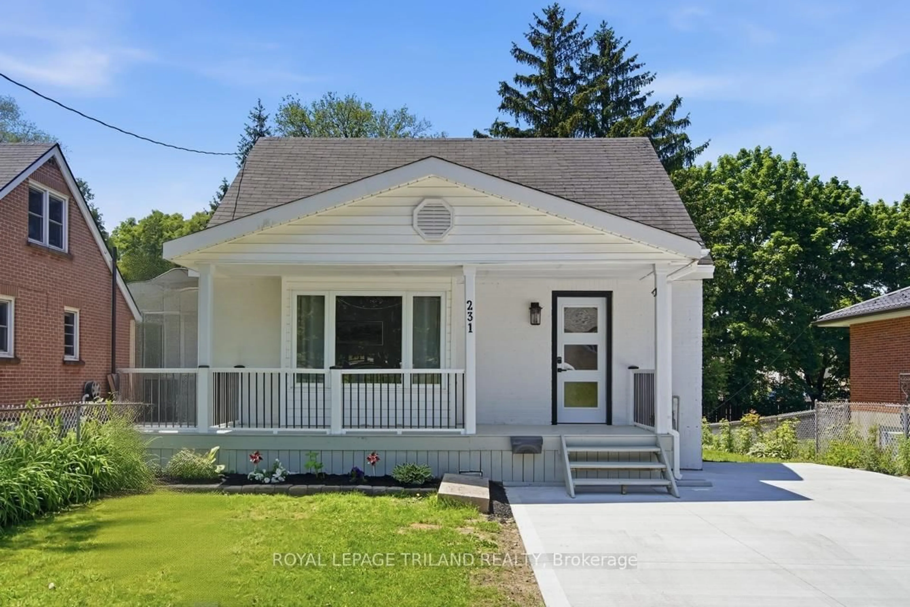Home with vinyl exterior material, street for 231 Taylor St, London East Ontario N5Y 2J6