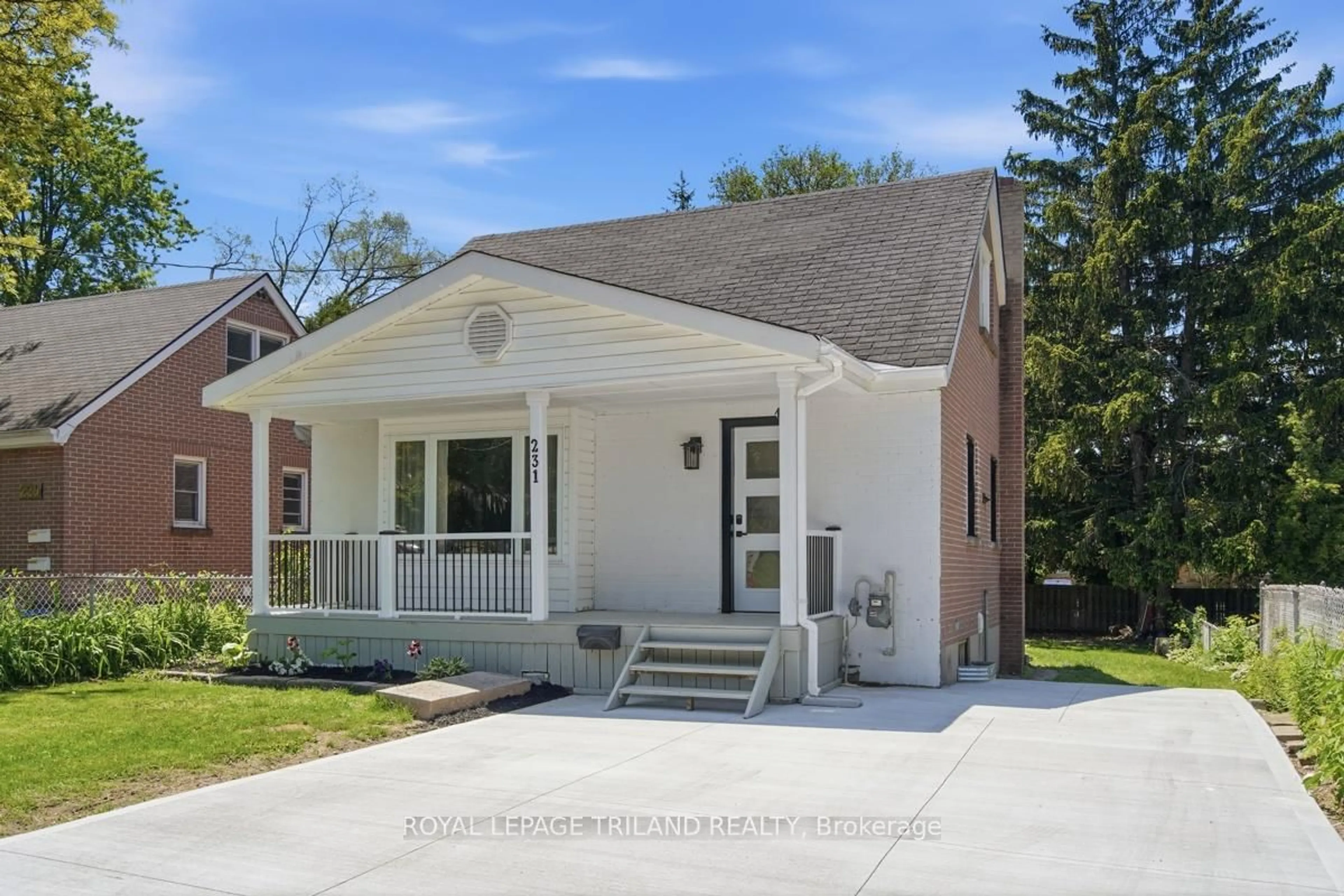 Home with vinyl exterior material, street for 231 Taylor St, London East Ontario N5Y 2J6